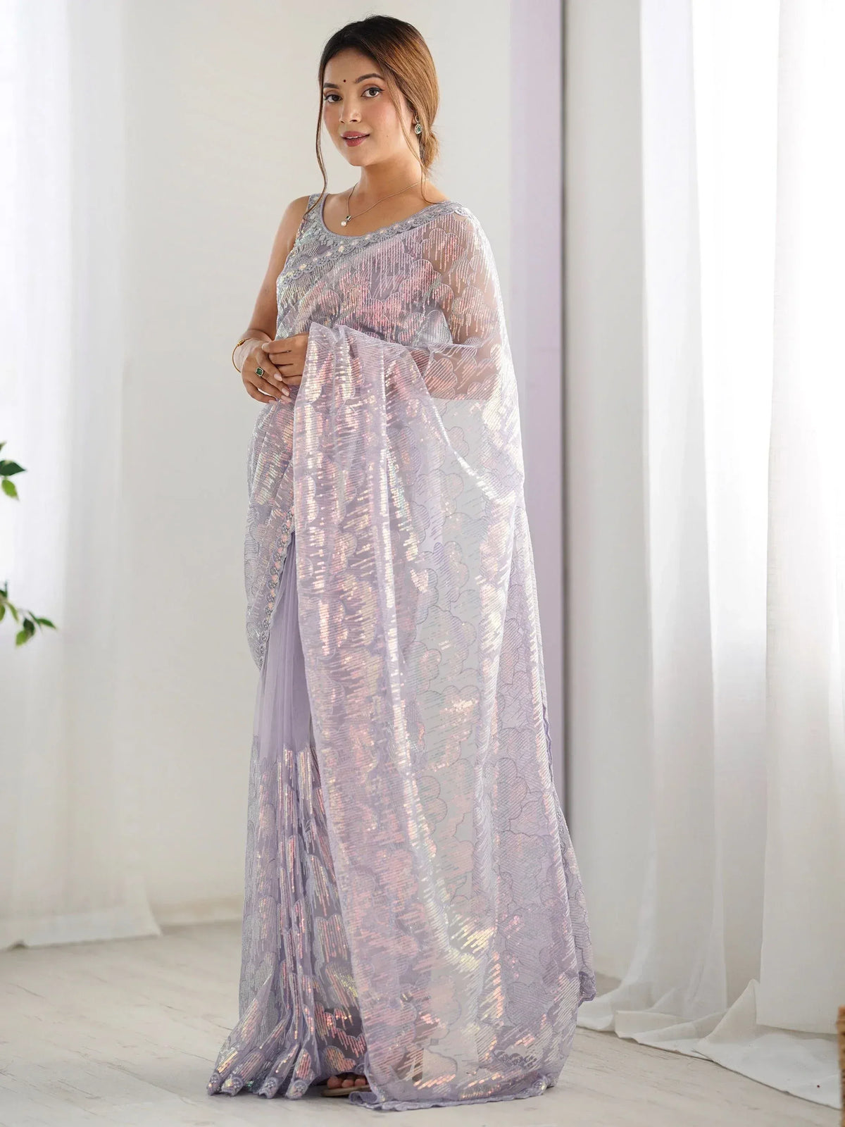 Lavender sequin saree with floral pattern, perfect for Indian ethnic wear events