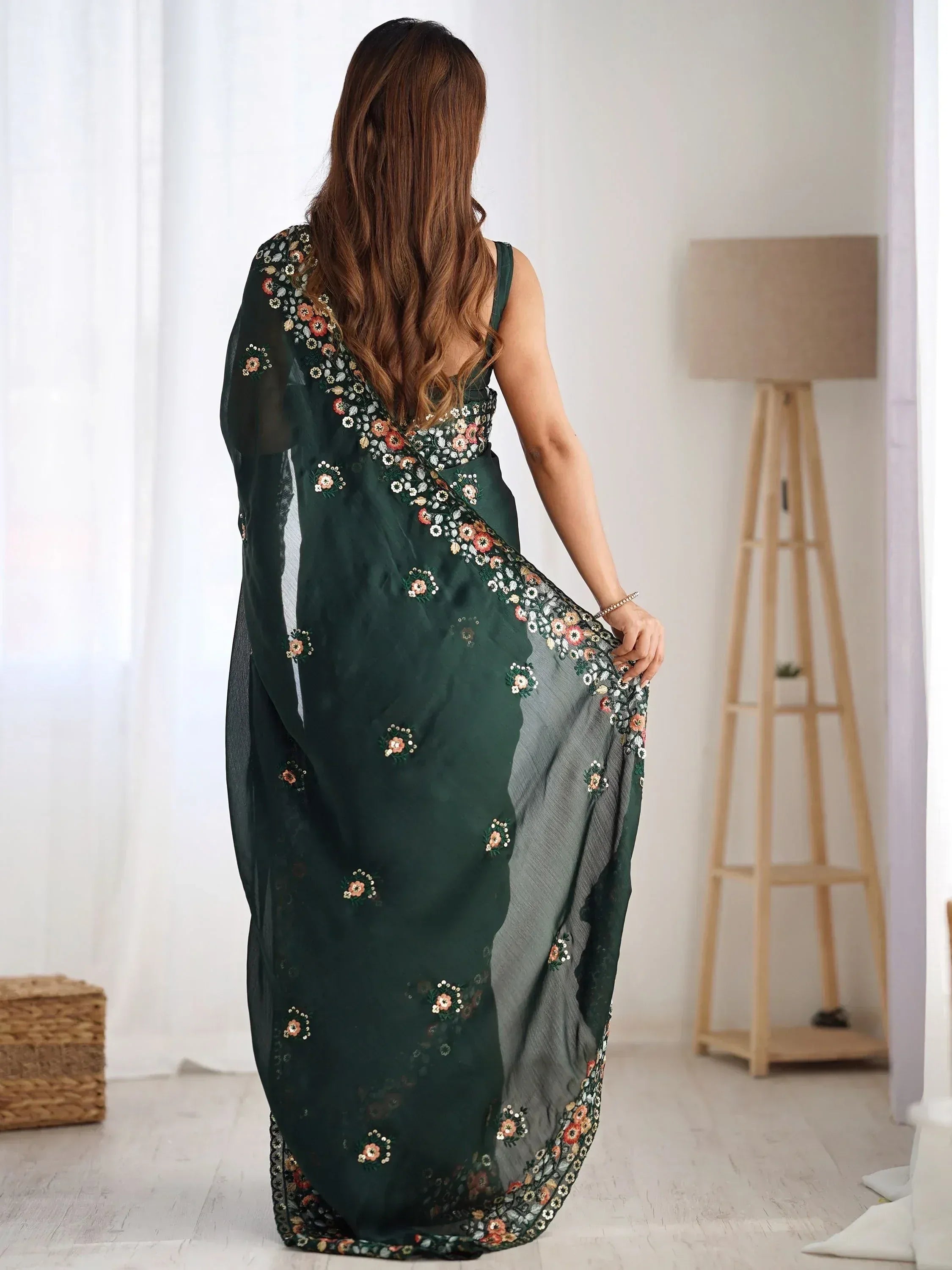 Dark green floral embroidered saree with sheer pallu, stylish Indian ethnic wear for women