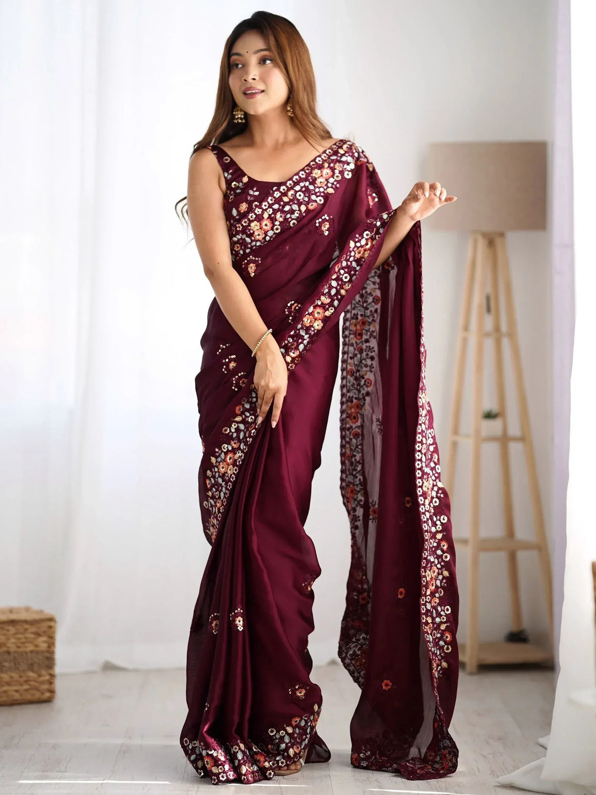 Woman in maroon floral embroidered saree with matching blouse, Indian ethnic wear