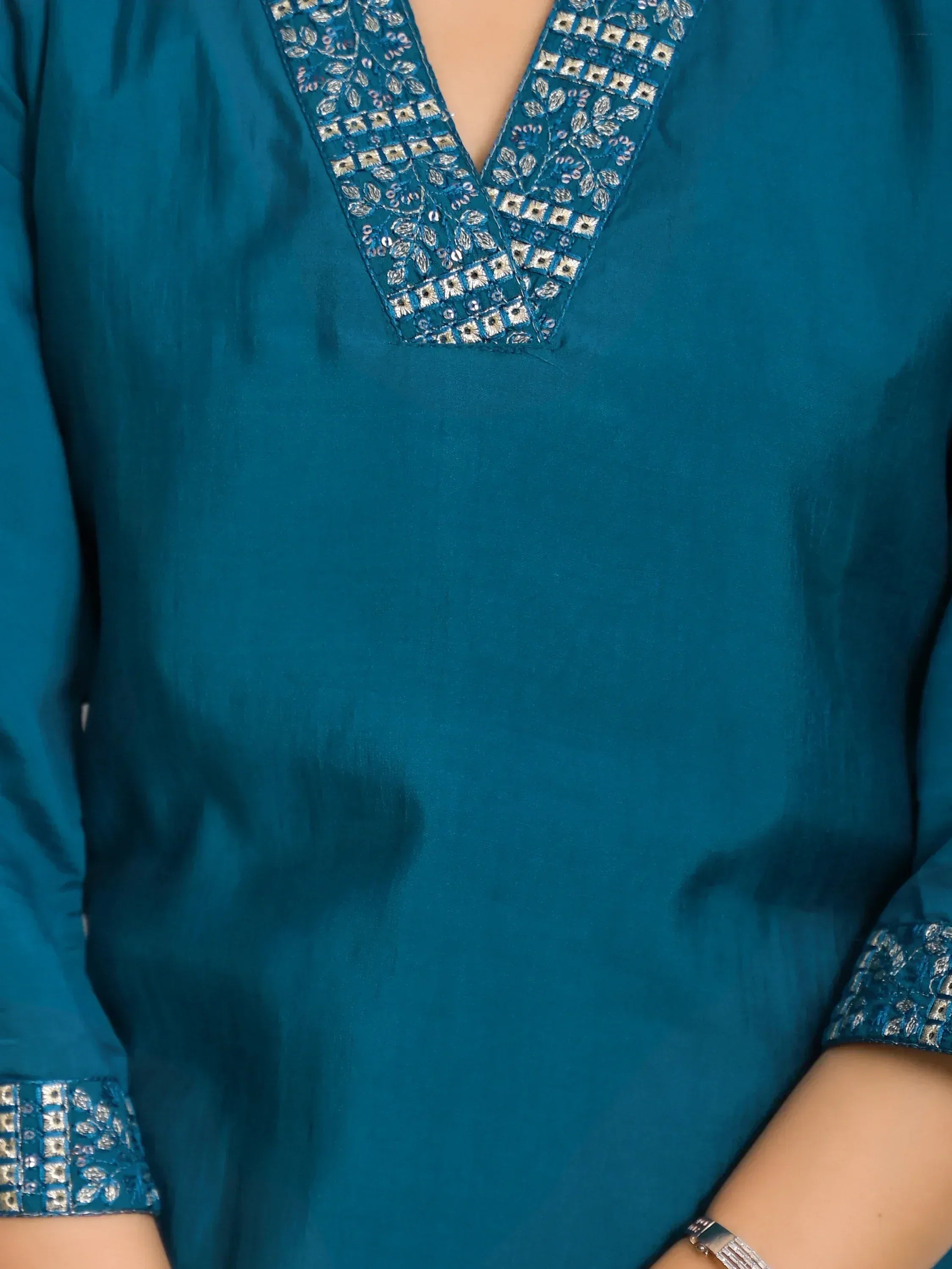 Teal ethnic kurti with mirror and thread embroidery on V-neck and sleeves, perfect for Indian wear
