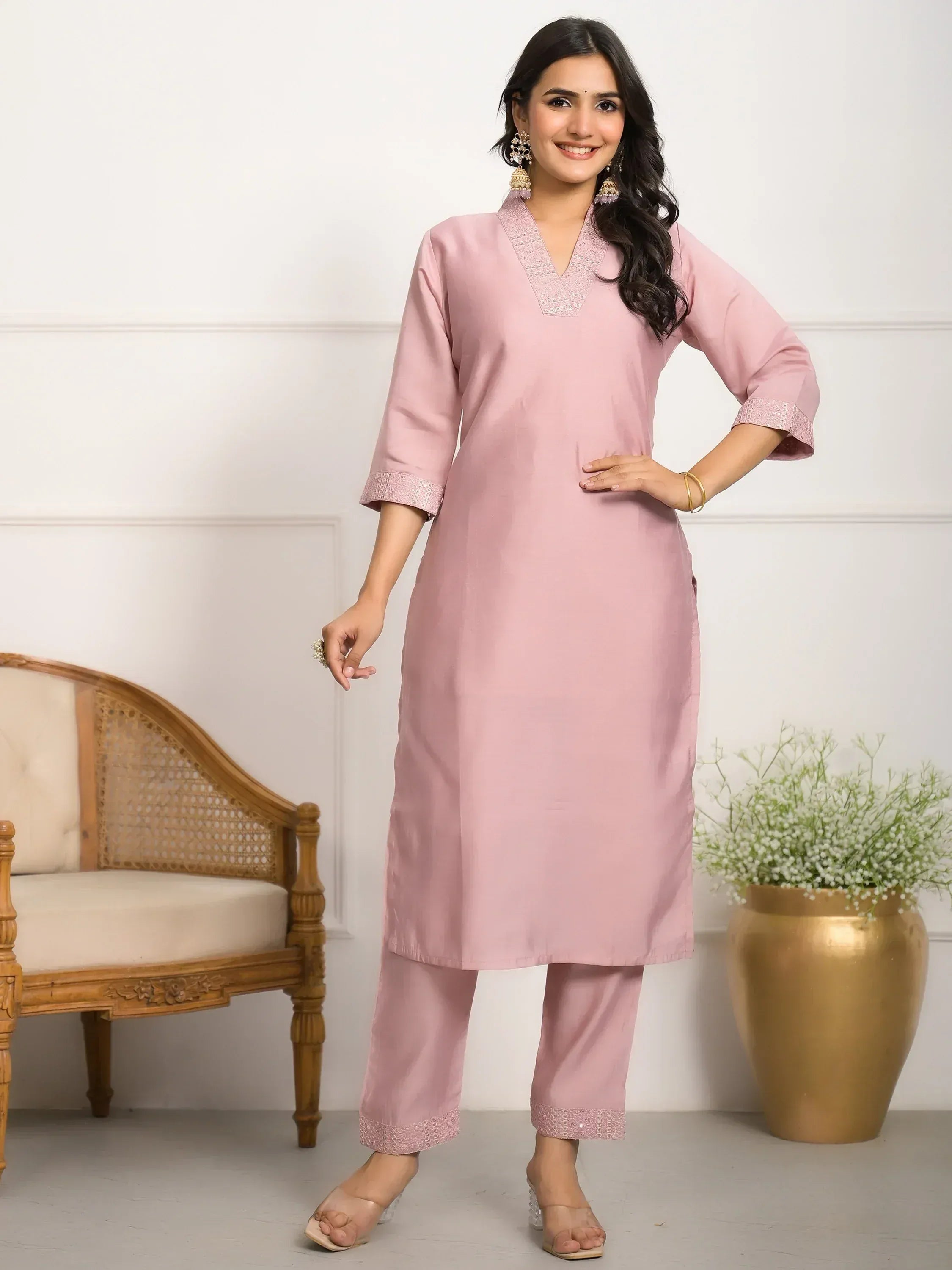 Pink ethnic kurta set with lace detailing, perfect for Indian wear and festive occasions.