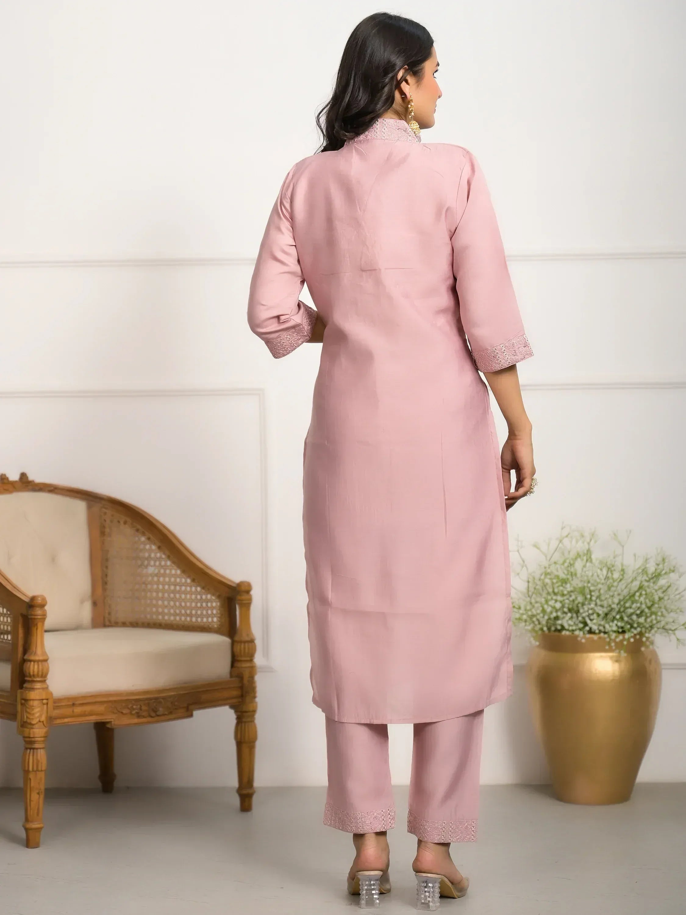 Pink ethnic kurta set with lace detailing, perfect for Indian wear and festive occasions.
