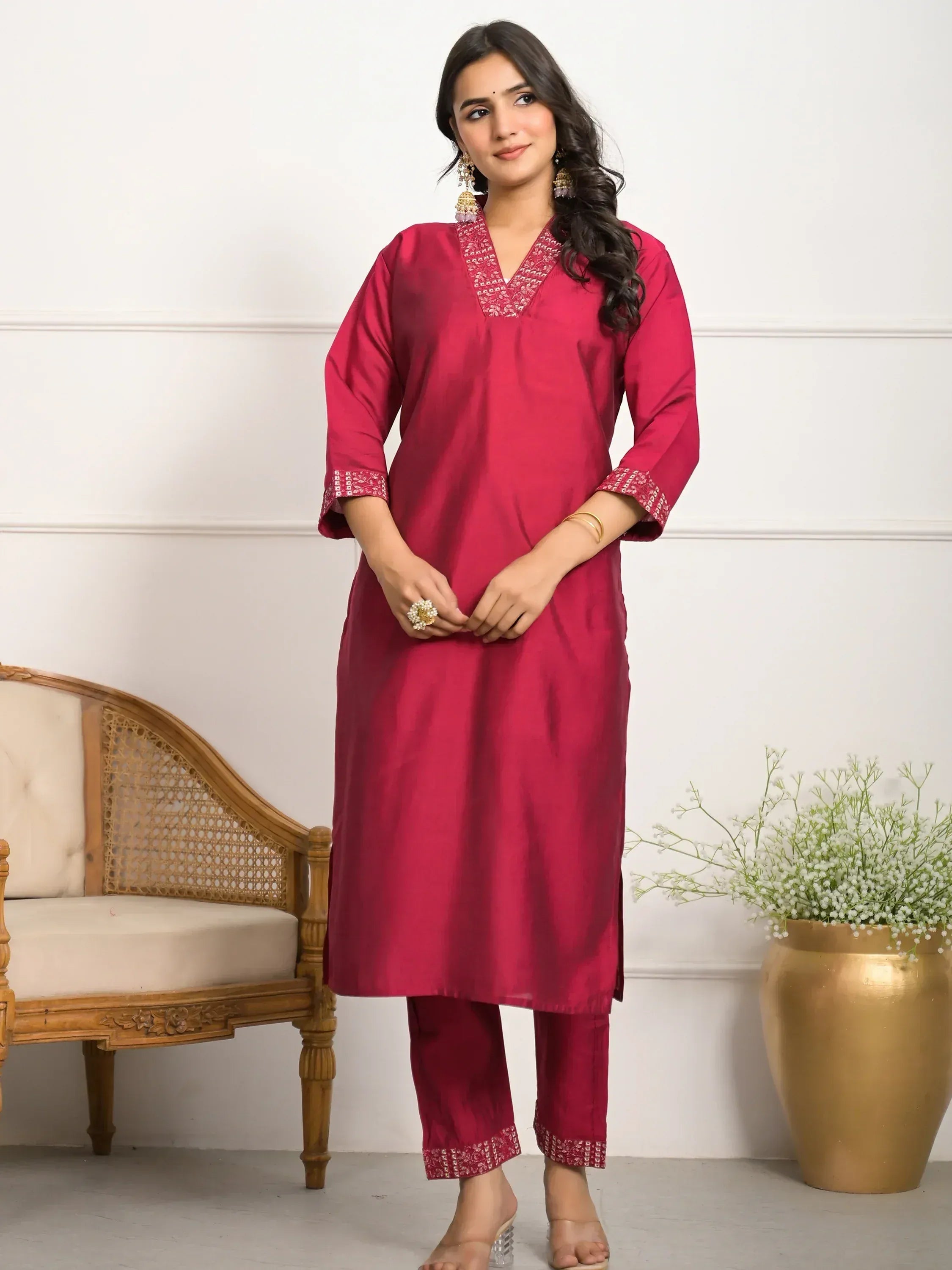 Maroon ethnic kurta with embroidered neckline and cuffs, paired with matching pants for Indian wear