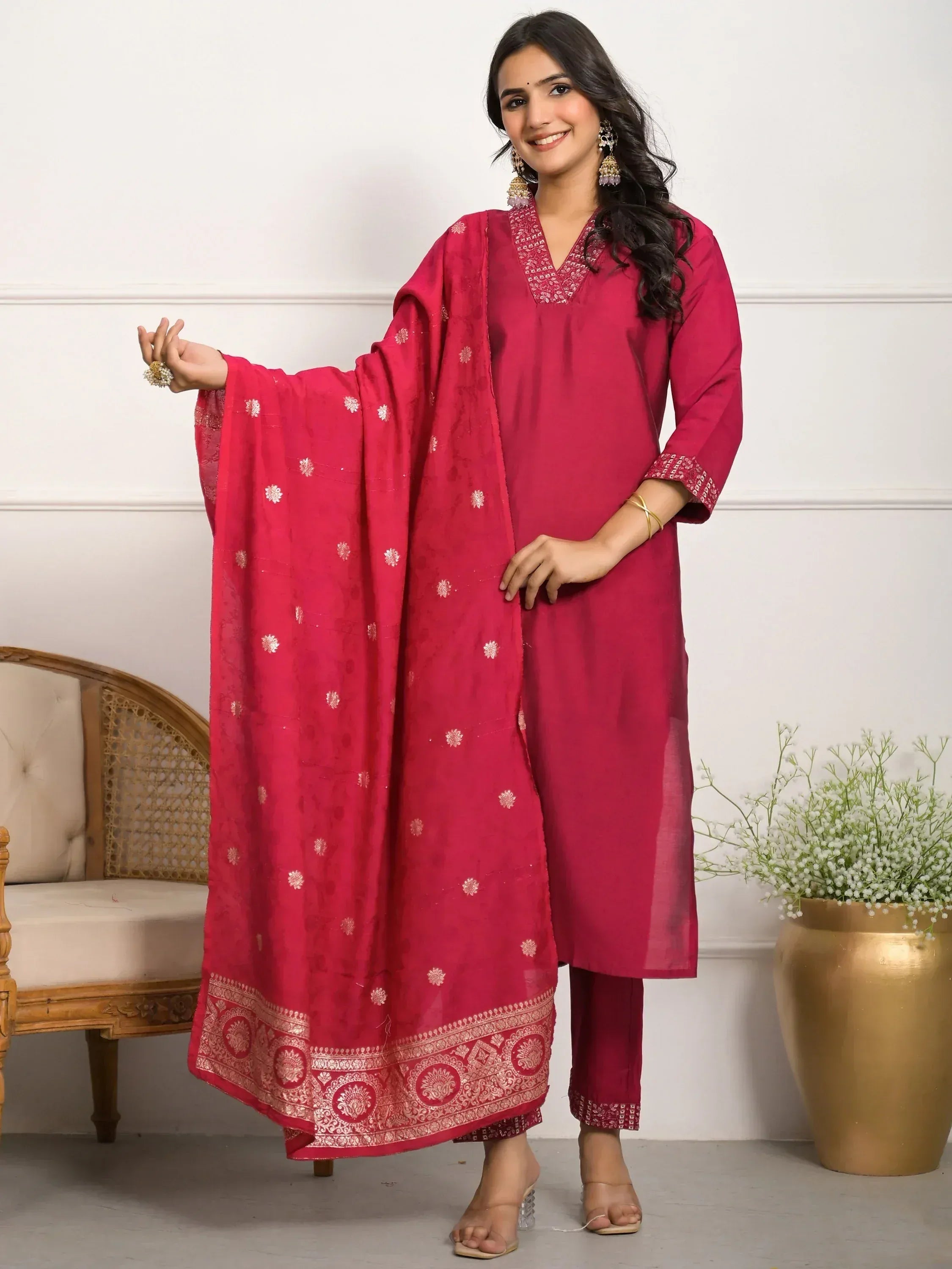 Woman in maroon Indian salwar kameez with embroidered dupatta, ethnic wear for women