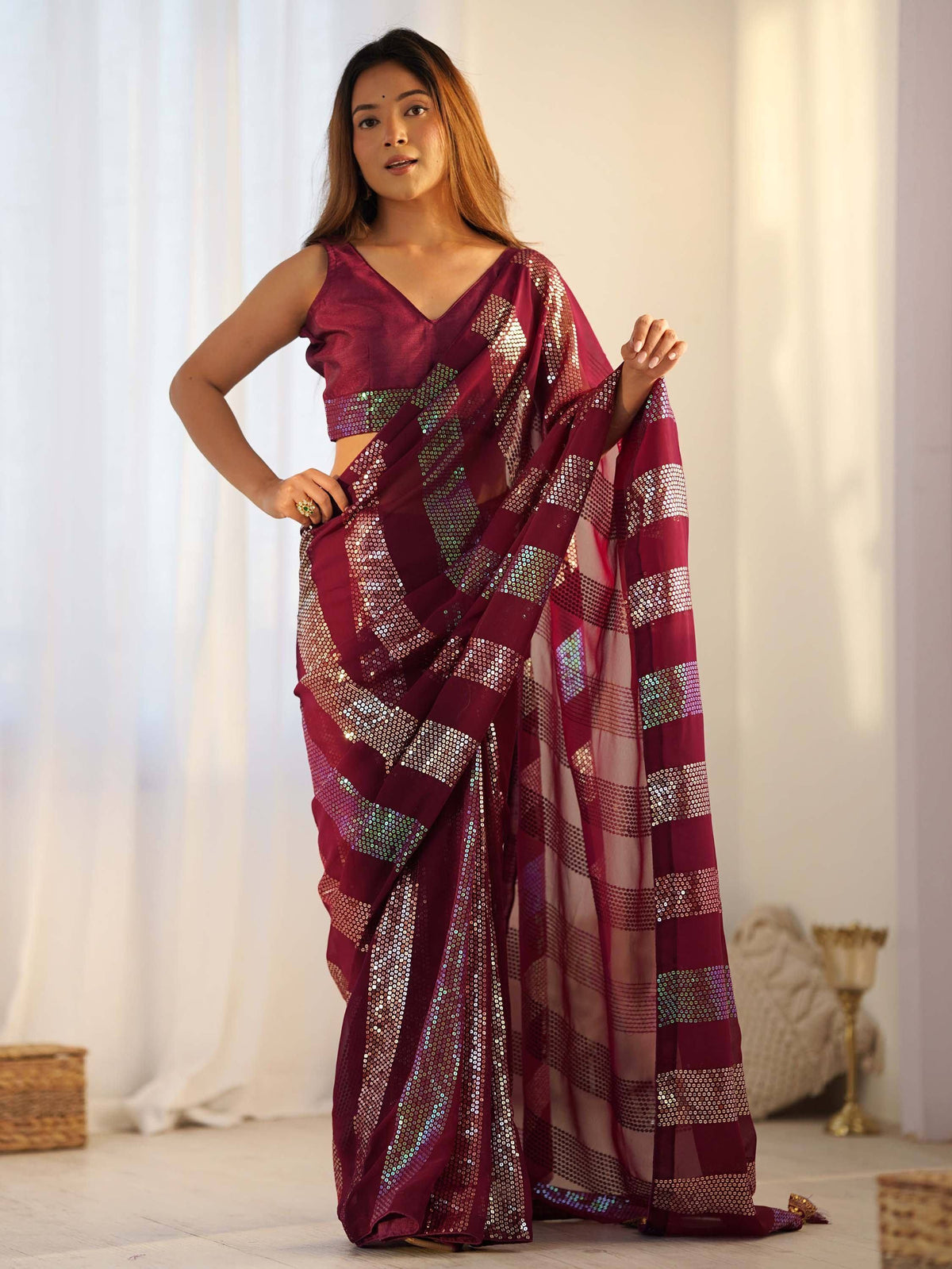 Maroon sequin saree with geometric pattern, perfect for Indian ethnic wear events