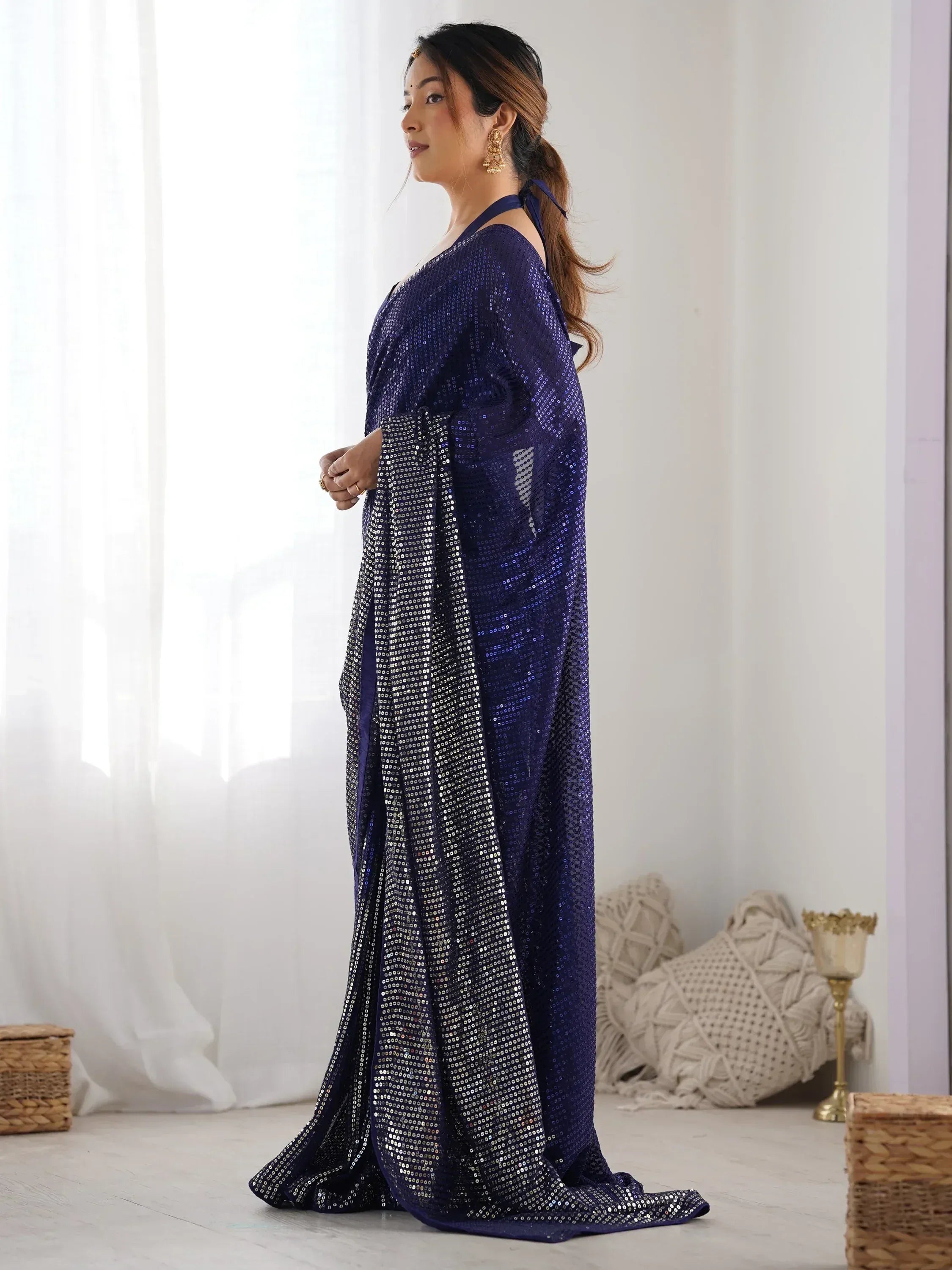 Navy blue sequin saree with silver embellishments, elegant Indian ethnic wear for festive occasions