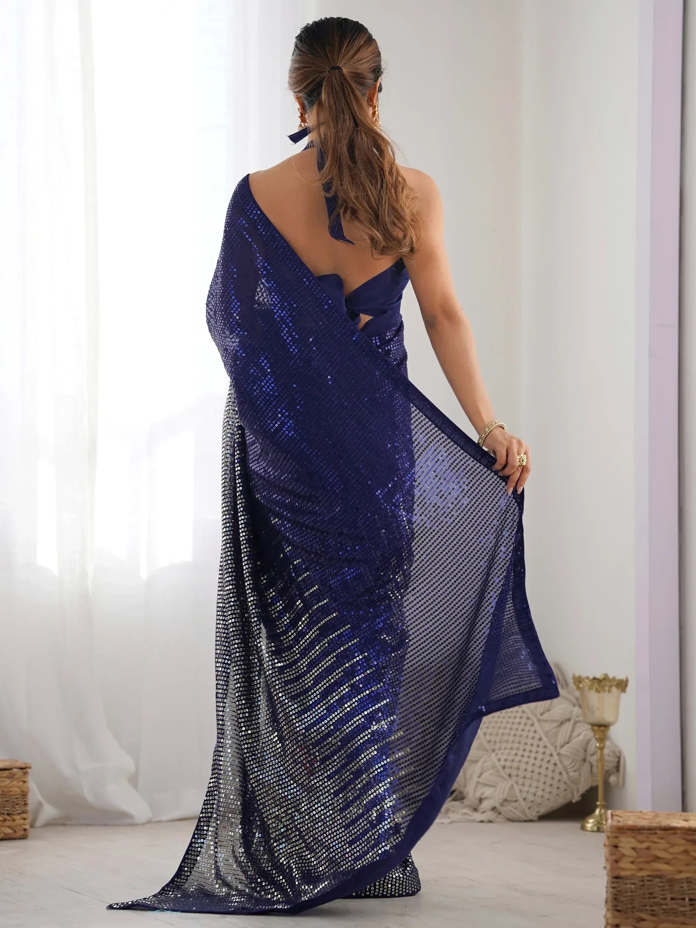 Navy blue sequin saree with backless blouse, elegant Indian ethnic wear for parties