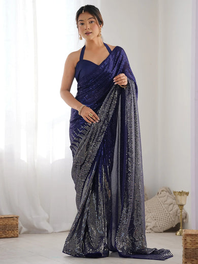 Spectacular Blue Sequins Georgette Party Wear Saree With Blouse
