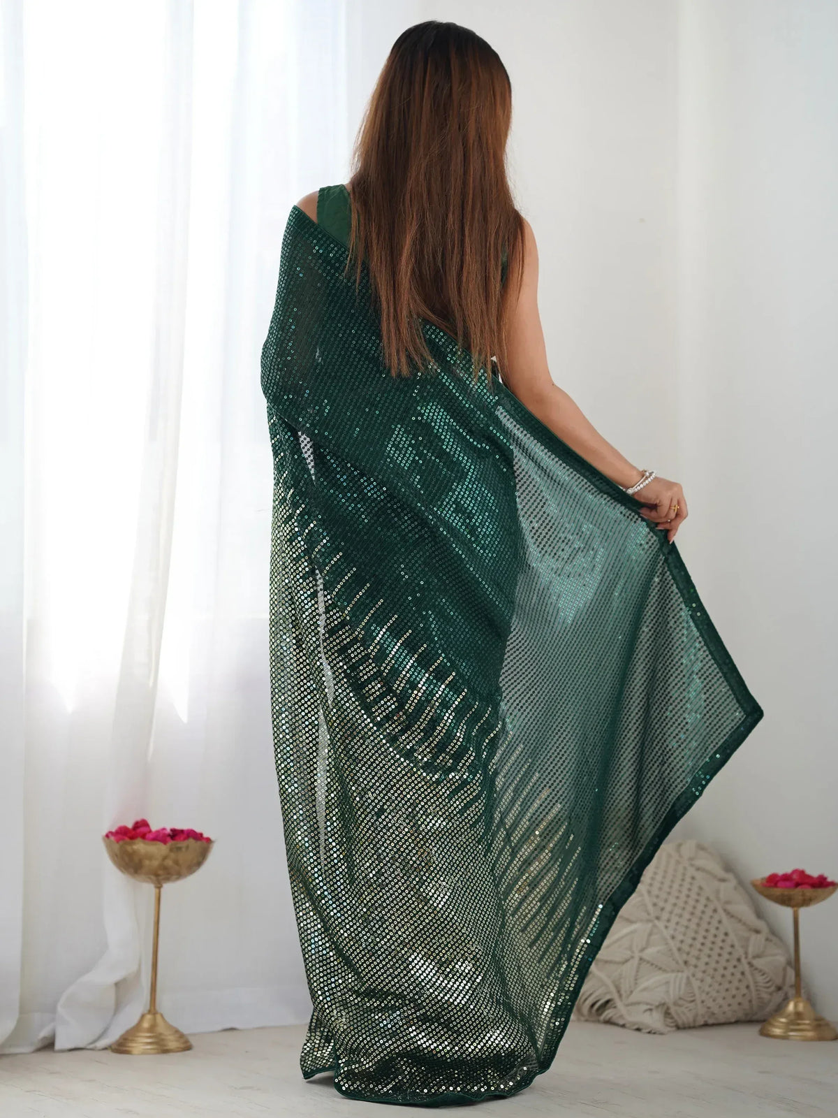 Emerald green sequin saree with sheer pallu, elegant Indian ethnic wear for parties