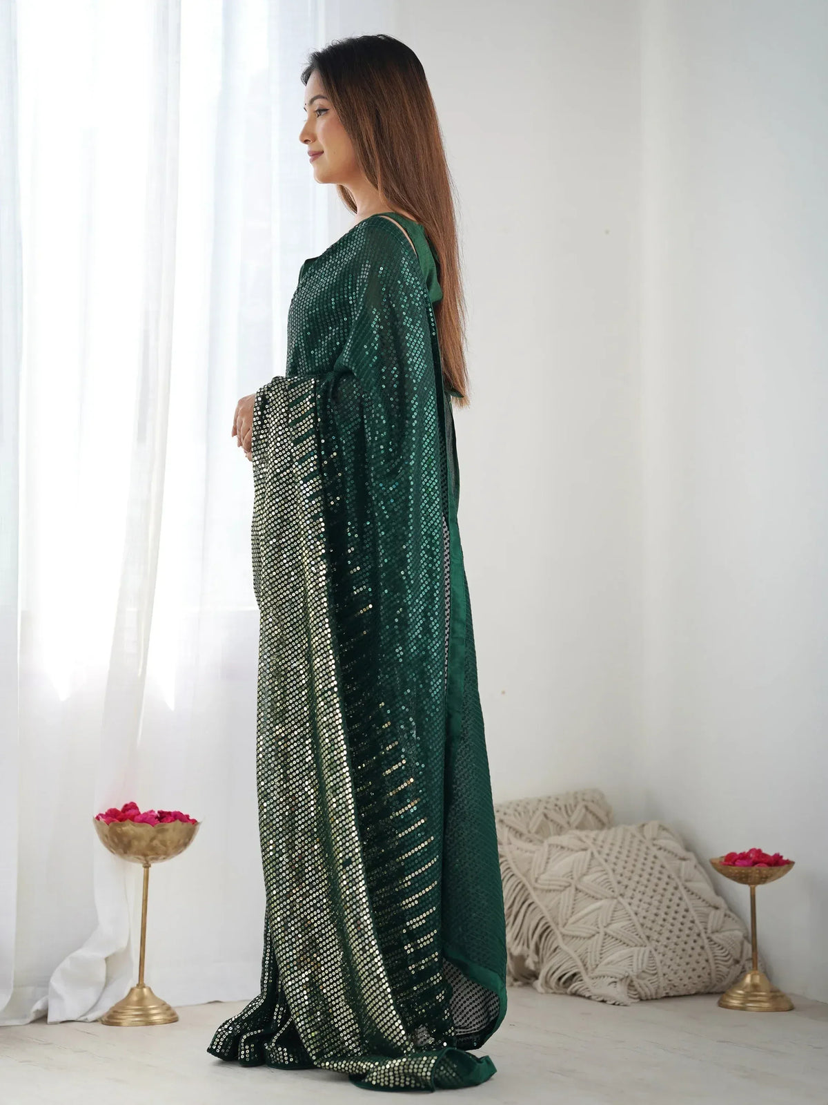 Emerald green sequin ethnic gown with flared sleeves, perfect for festive occasions and parties