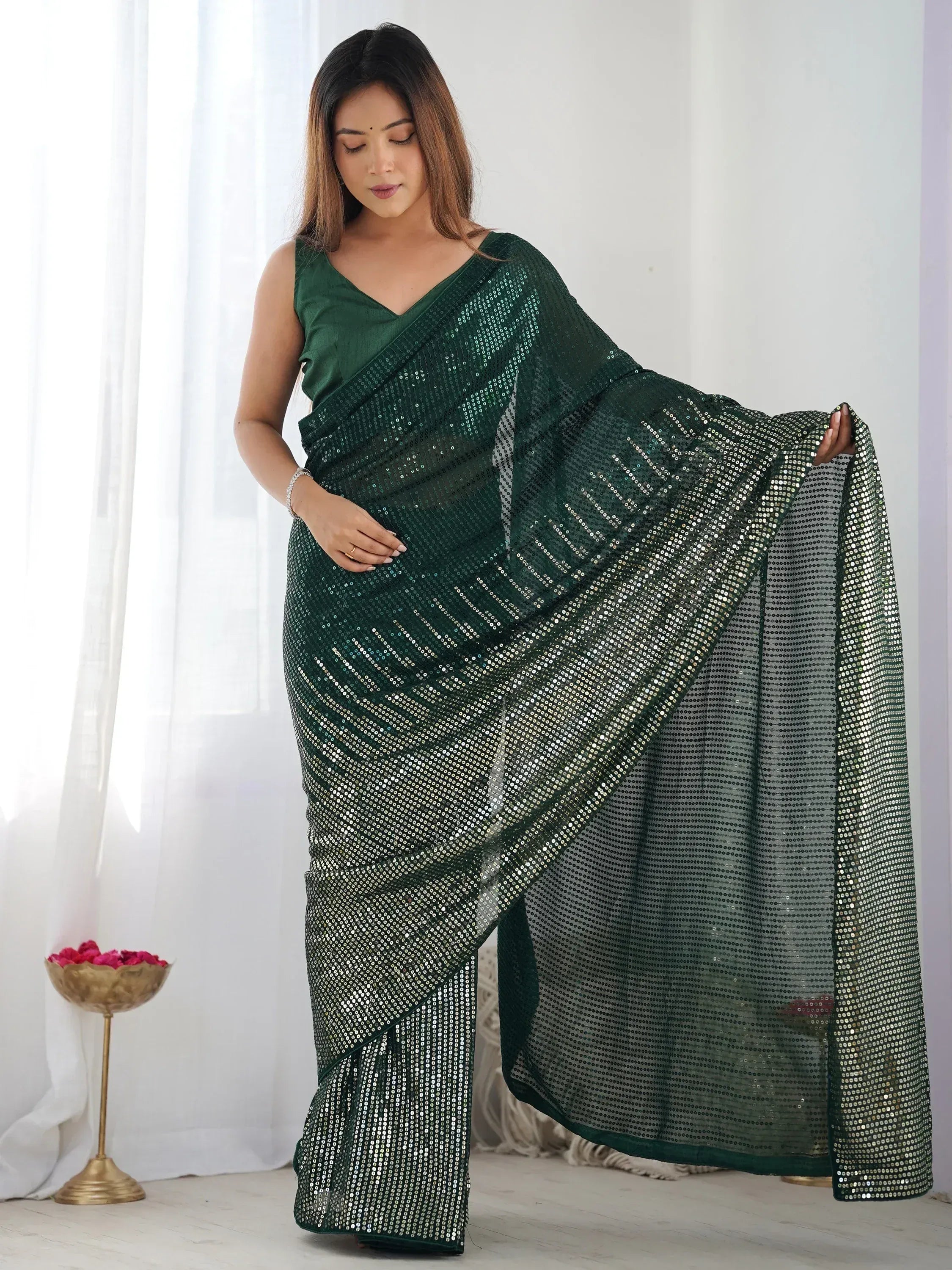 Emerald green sequin saree with V-neck blouse, elegant Indian ethnic wear for parties