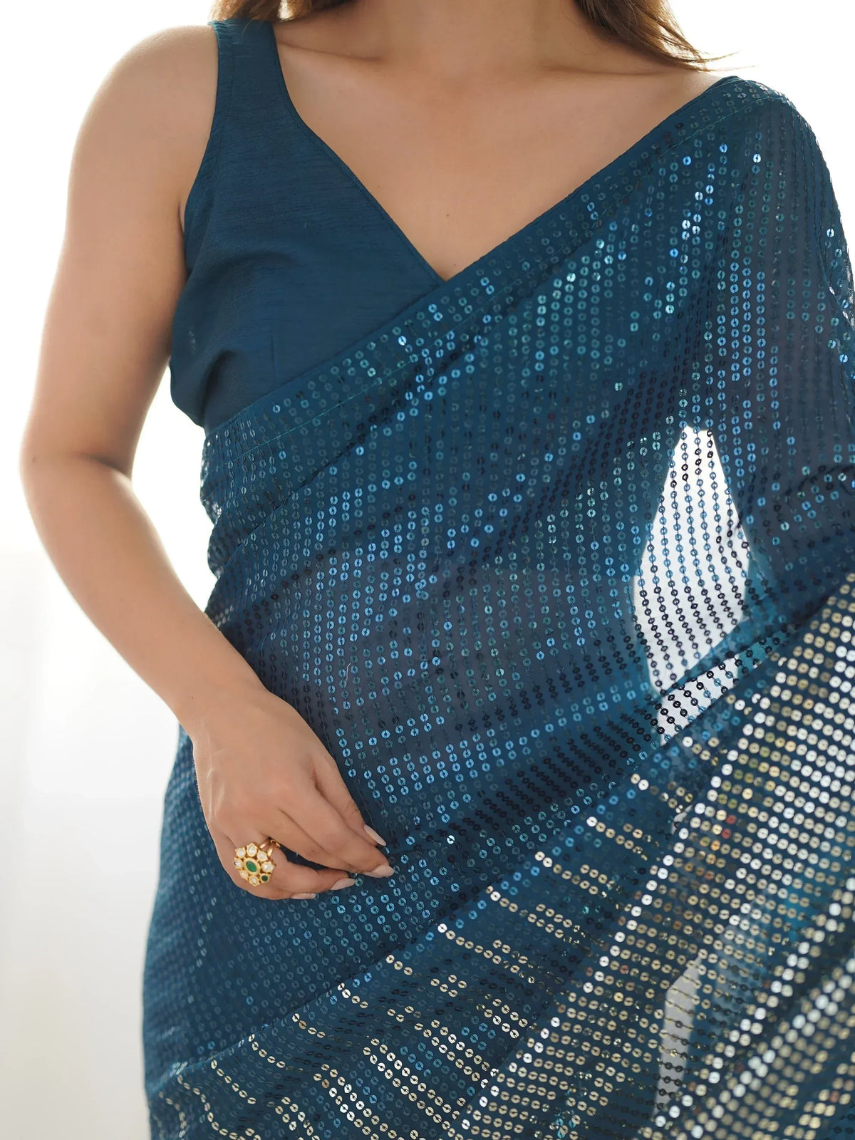 Teal sequin saree with V-neck blouse, ethnic Indian wear for festive occasions