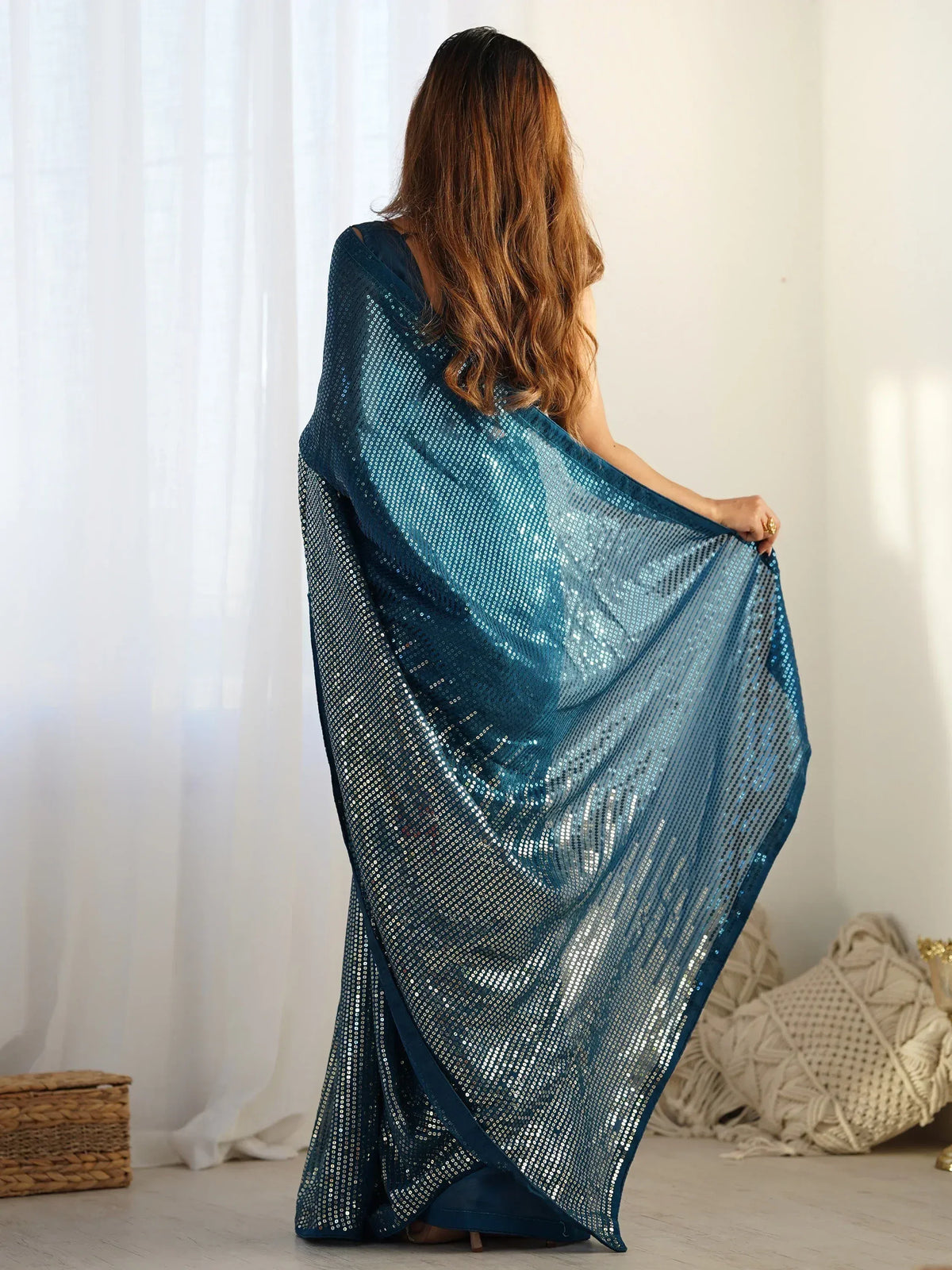 Teal sequin saree with shimmering design, perfect for Indian ethnic wear and festive occasions