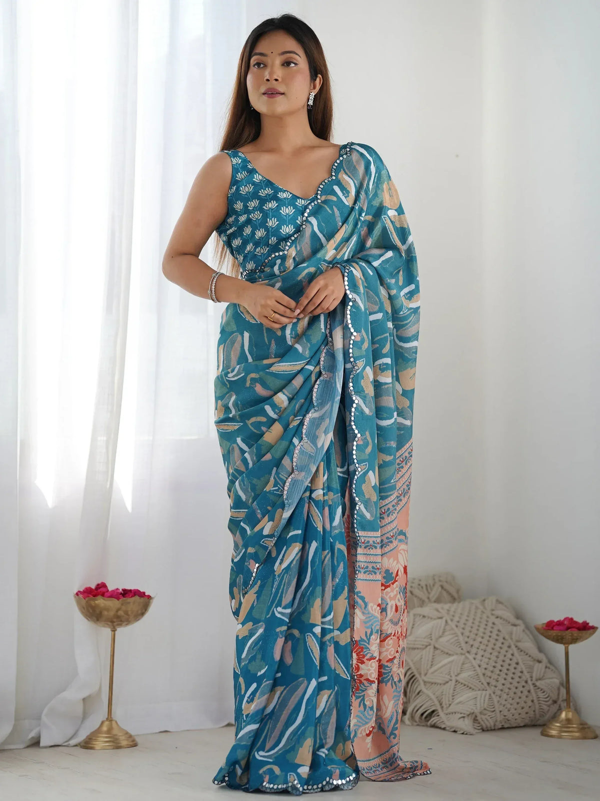 Teal printed saree with floral blouse and sequin border, ethnic Indian wear for women