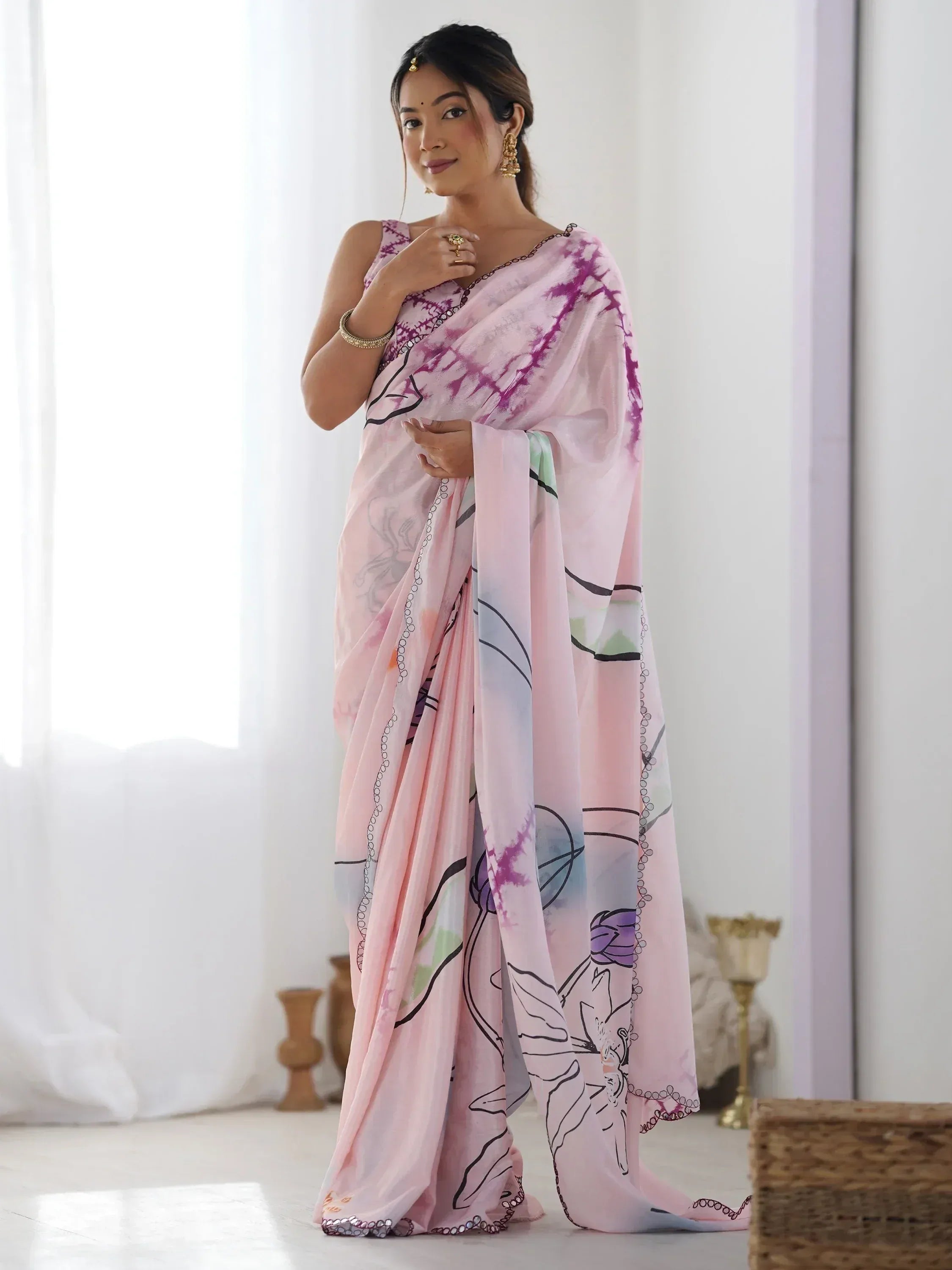 Pink floral print saree with tie-dye accents, ethnic Indian wear for women