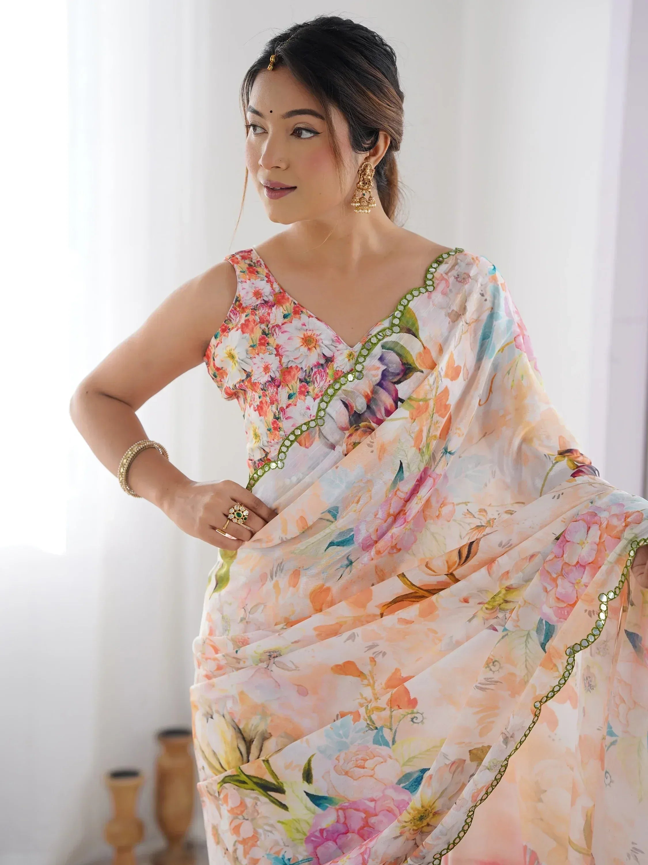 Woman in floral print saree with mirror work, Indian ethnic wear, designer saree for women