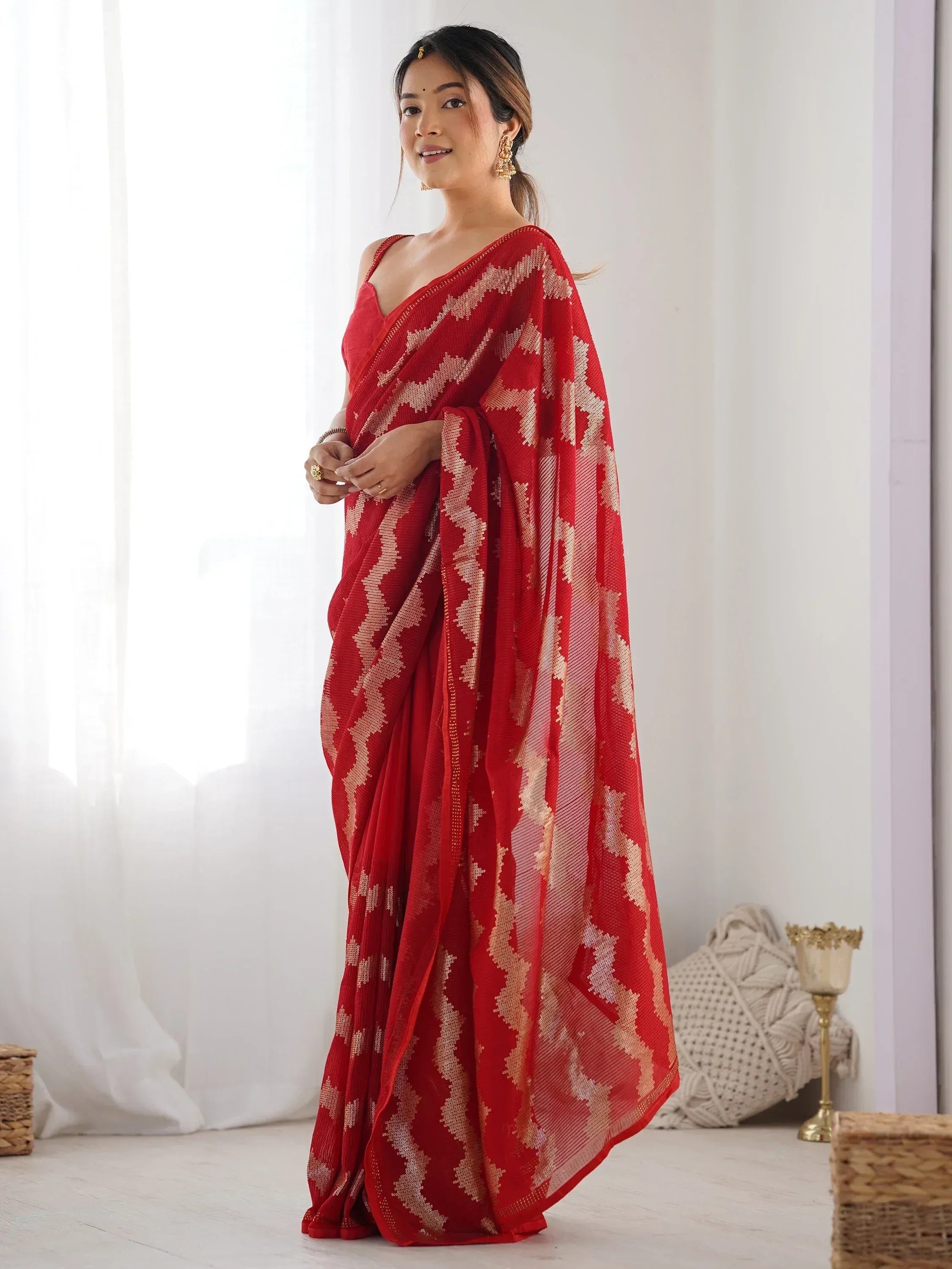 Red ethnic saree with gold geometric pattern, perfect for Indian occasions and festive wear