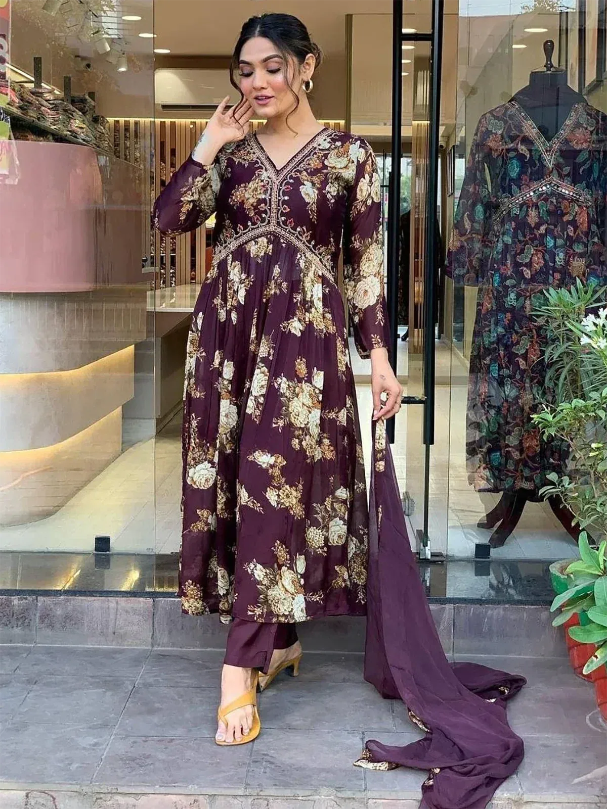 Purple floral printed ethnic gown with matching pants and dupatta, perfect for Indian occasions
