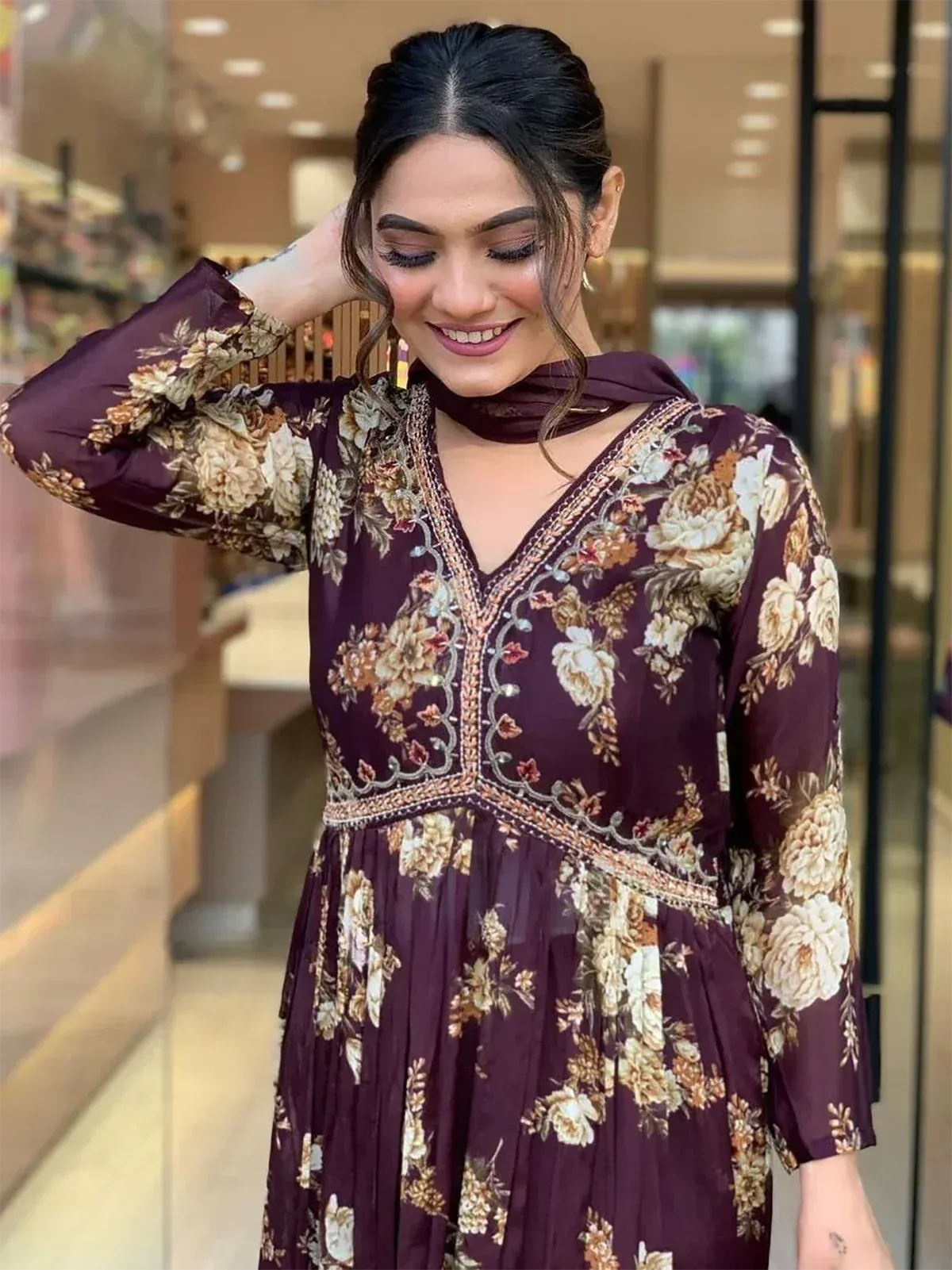 Pink floral print ethnic kurta with white lace detailing, perfect for Indian wear