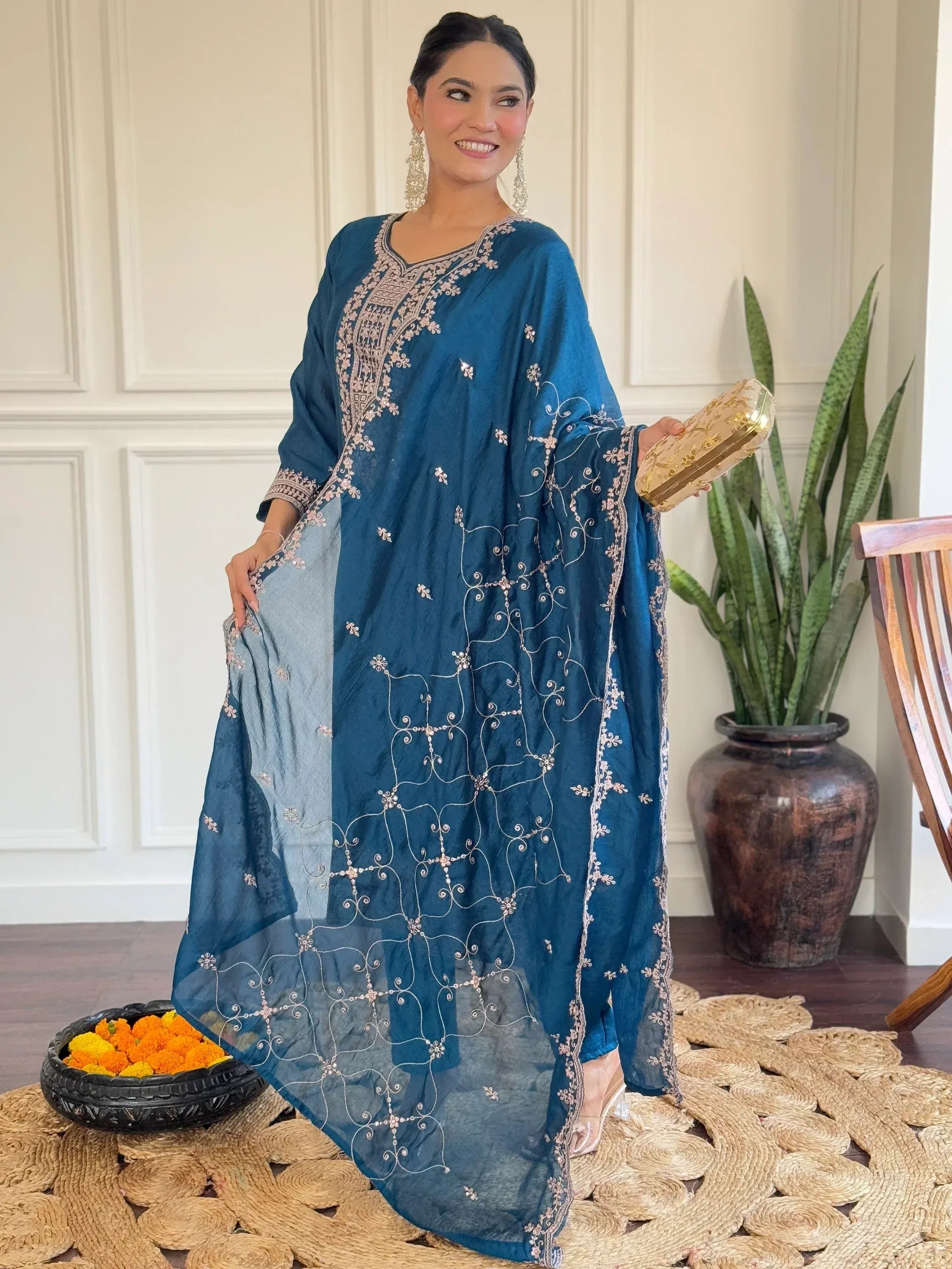 Teal embroidered ethnic gown with dupatta, perfect for Indian occasions and festive wear