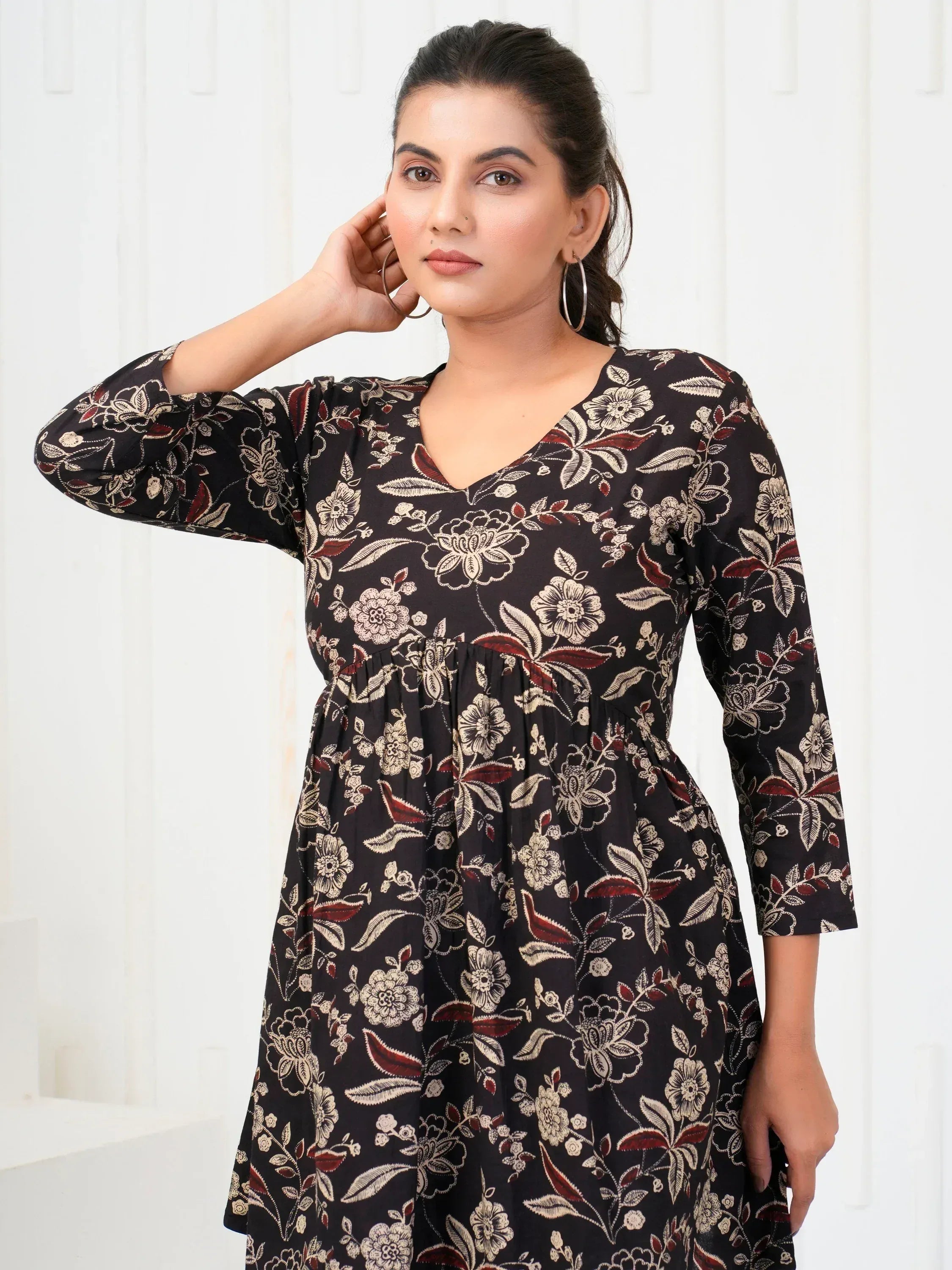 Black floral print ethnic gown with V-neck and 3/4 sleeves, perfect for Indian wear