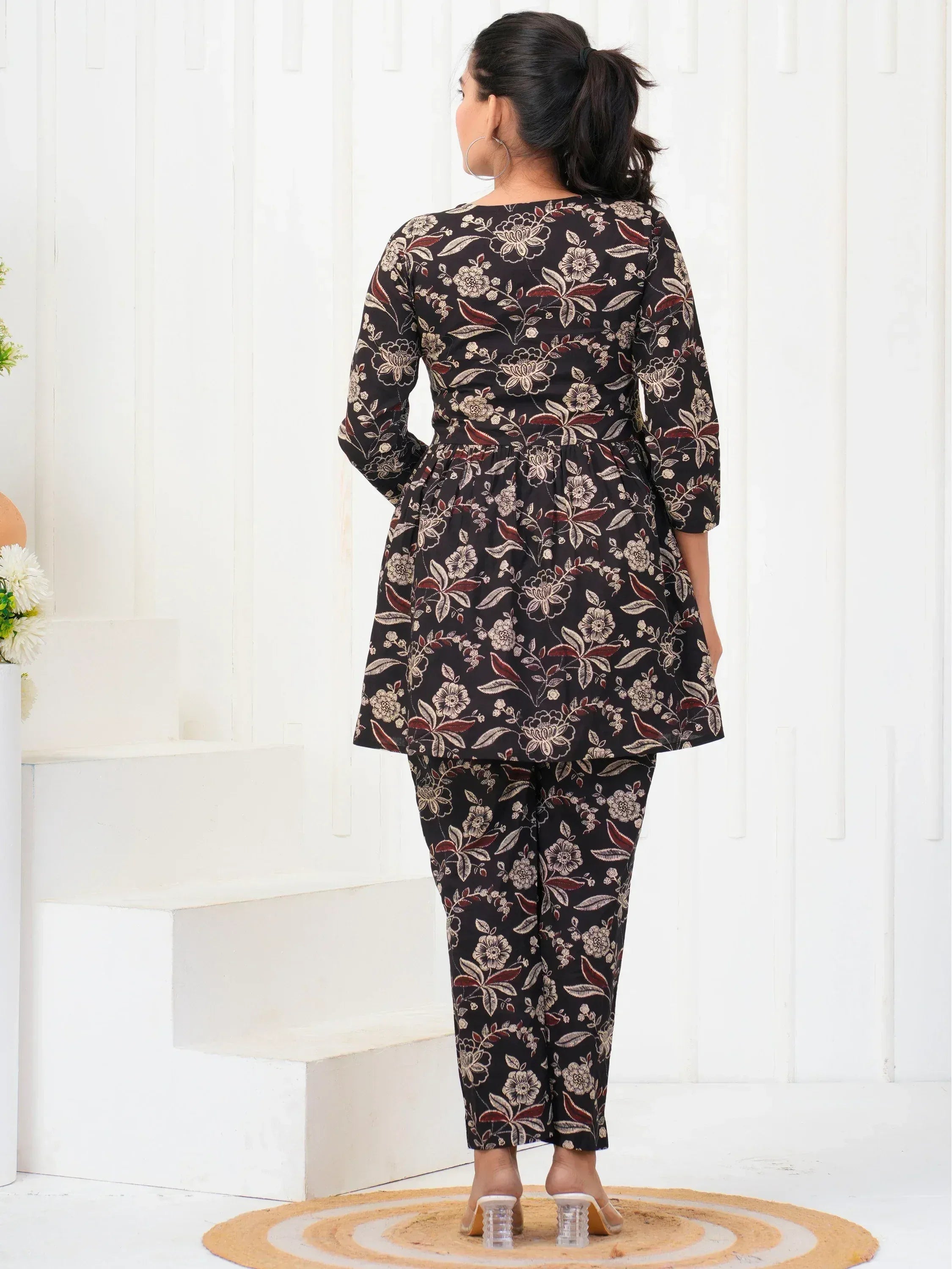 Black floral print ethnic kurta set with palazzo pants, perfect for Indian wear occasions