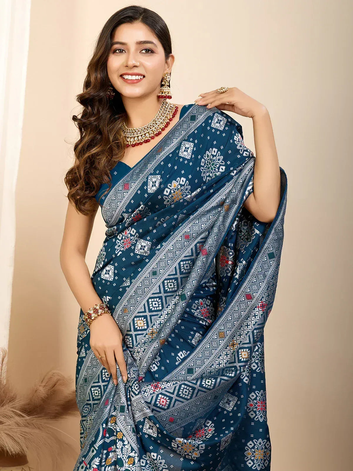 Blue printed saree with ethnic floral patterns, perfect for Indian traditional wear