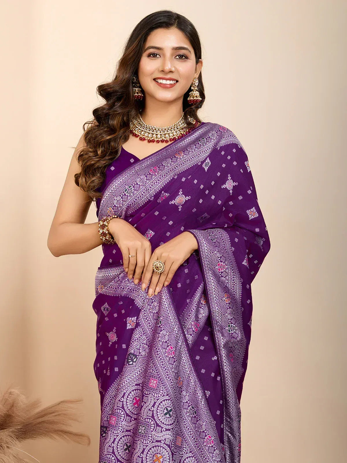 Purple printed saree with ethnic jewelry, perfect for Indian occasions and festive wear