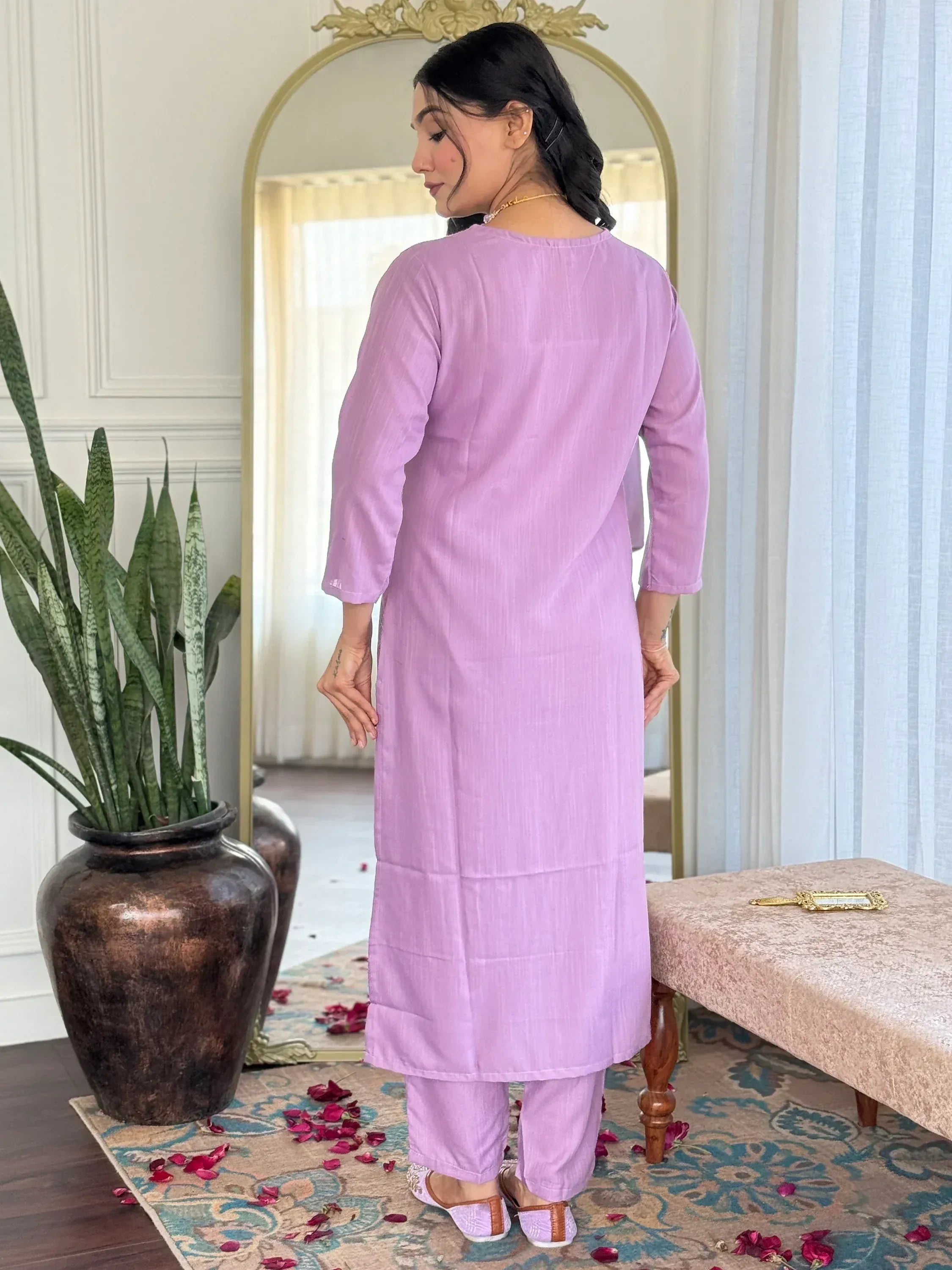 Lavender ethnic kurta set with matching pants, styled for traditional Indian wear