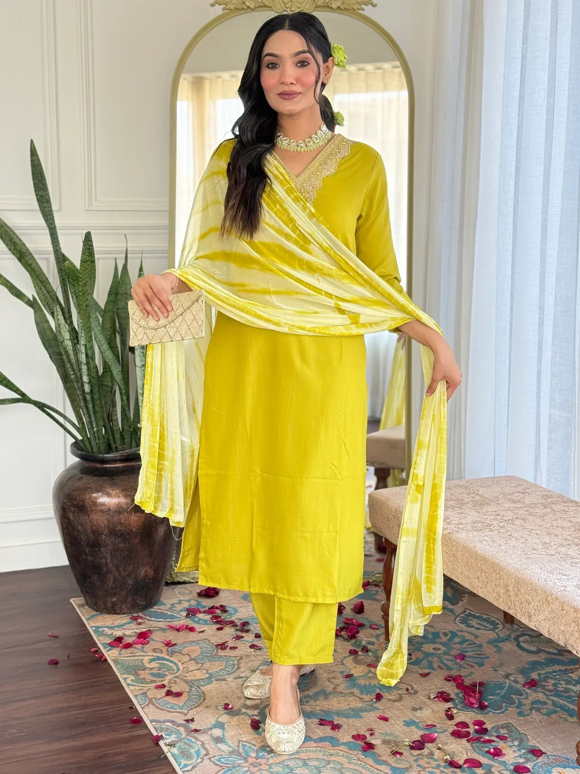 Vibrant yellow ethnic salwar kameez with tie-dye dupatta, perfect for festive occasions
