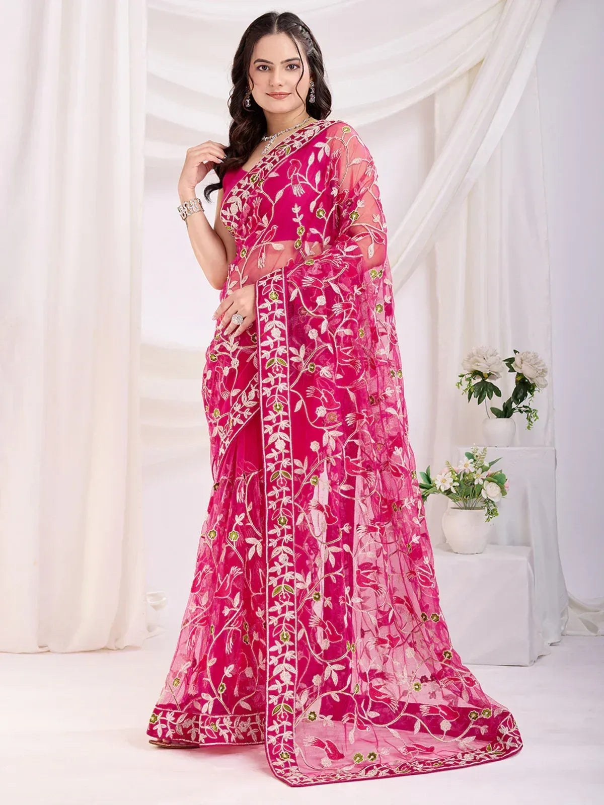 Pink embroidered saree with floral design, perfect for Indian ethnic wear occasions
