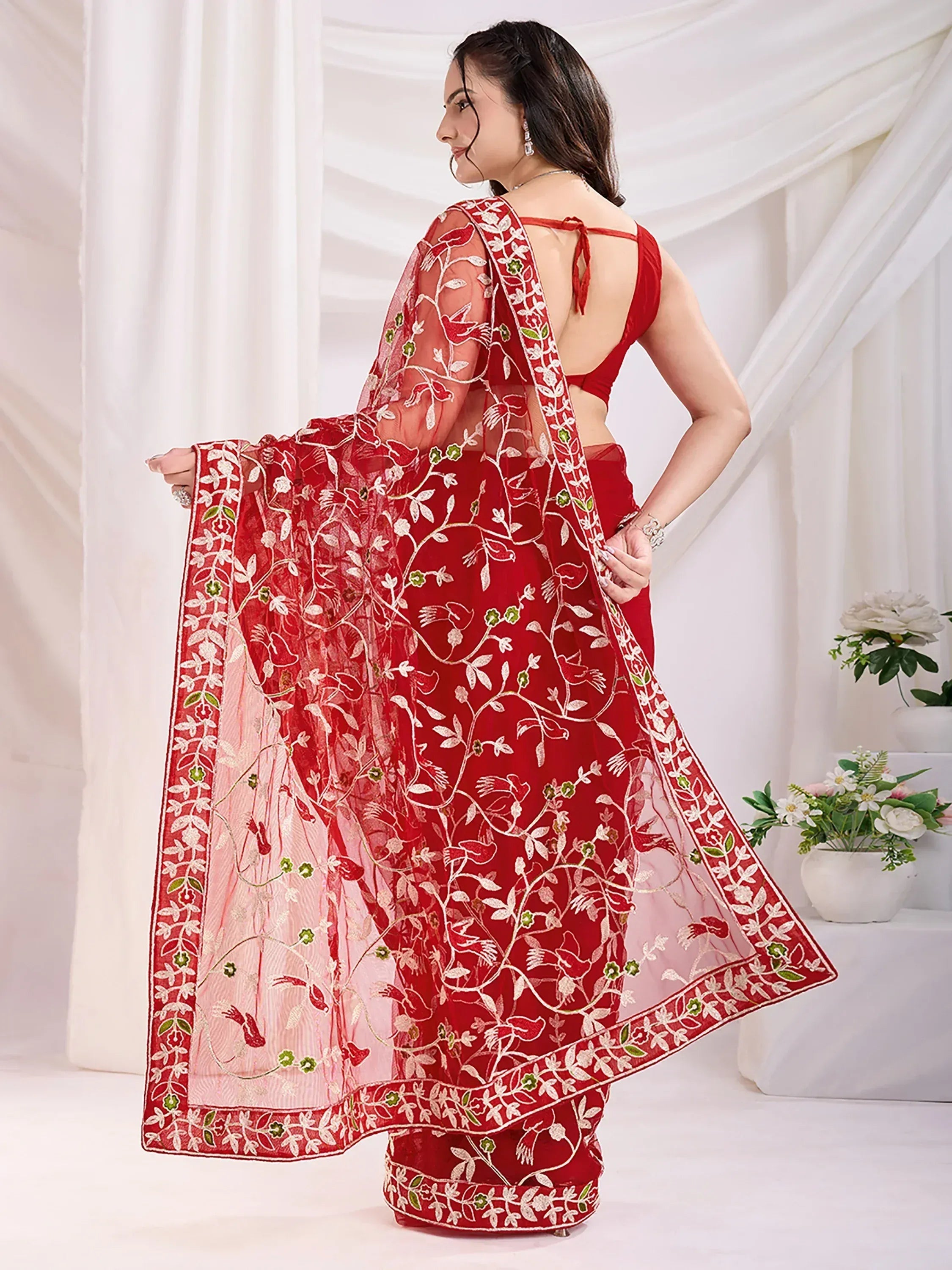 Red embroidered saree with floral and bird motifs, backless blouse, sheer dupatta for Indian ethnic wear