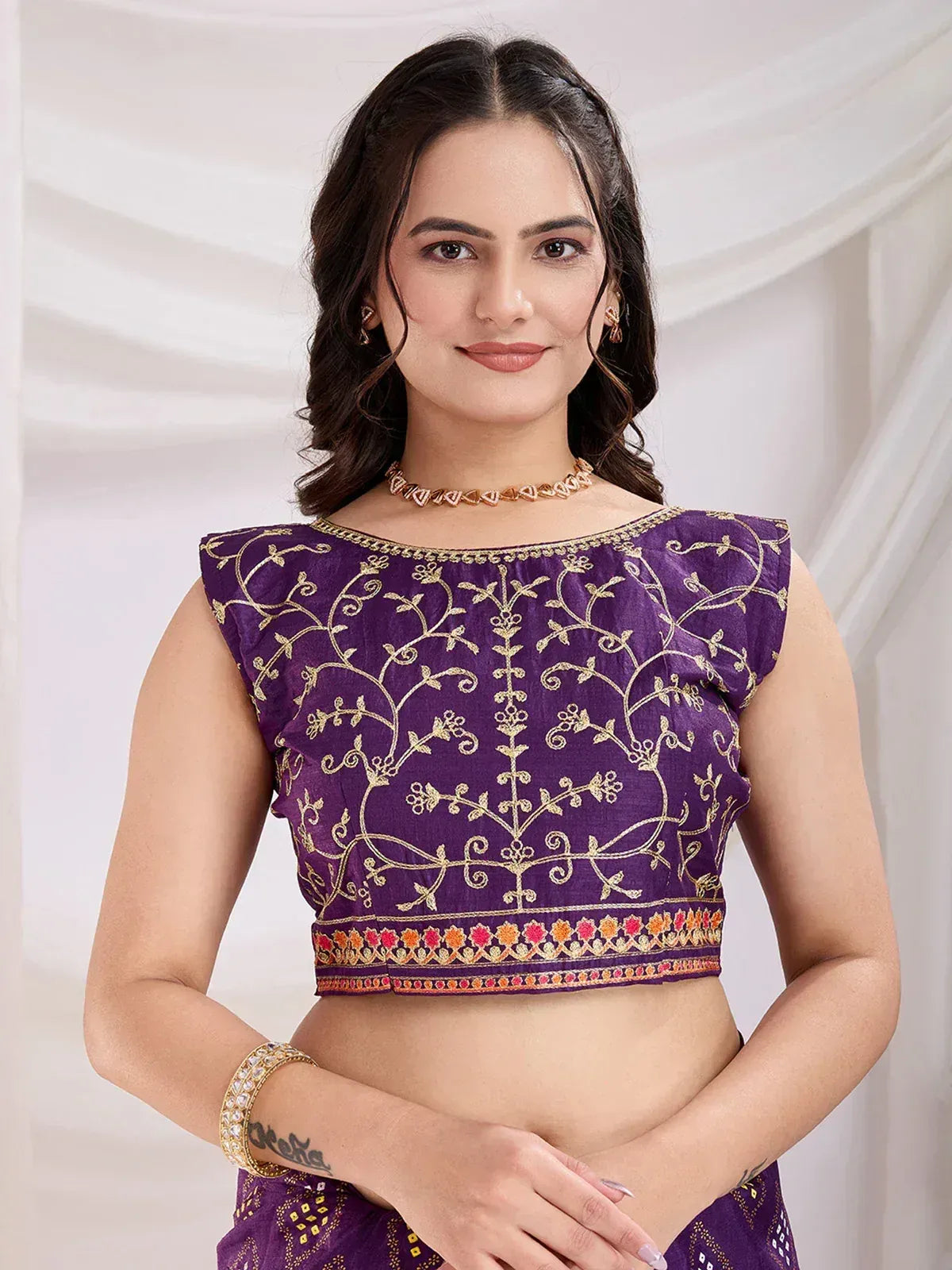 Purple embroidered crop top with gold floral work, perfect for Indian ethnic wear and lehenga choli sets