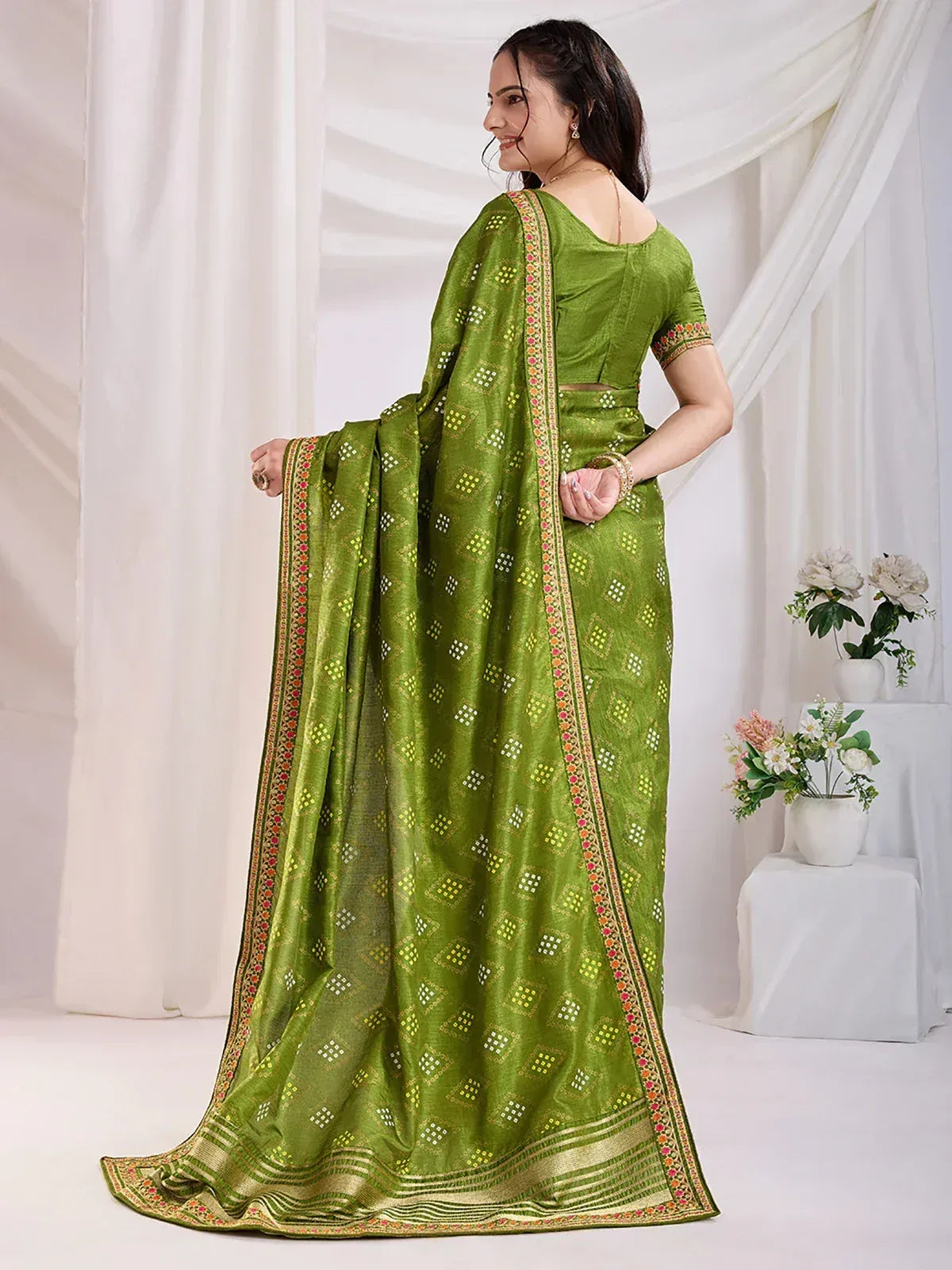 Green printed saree with embroidered border, stylish ethnic wear for women
