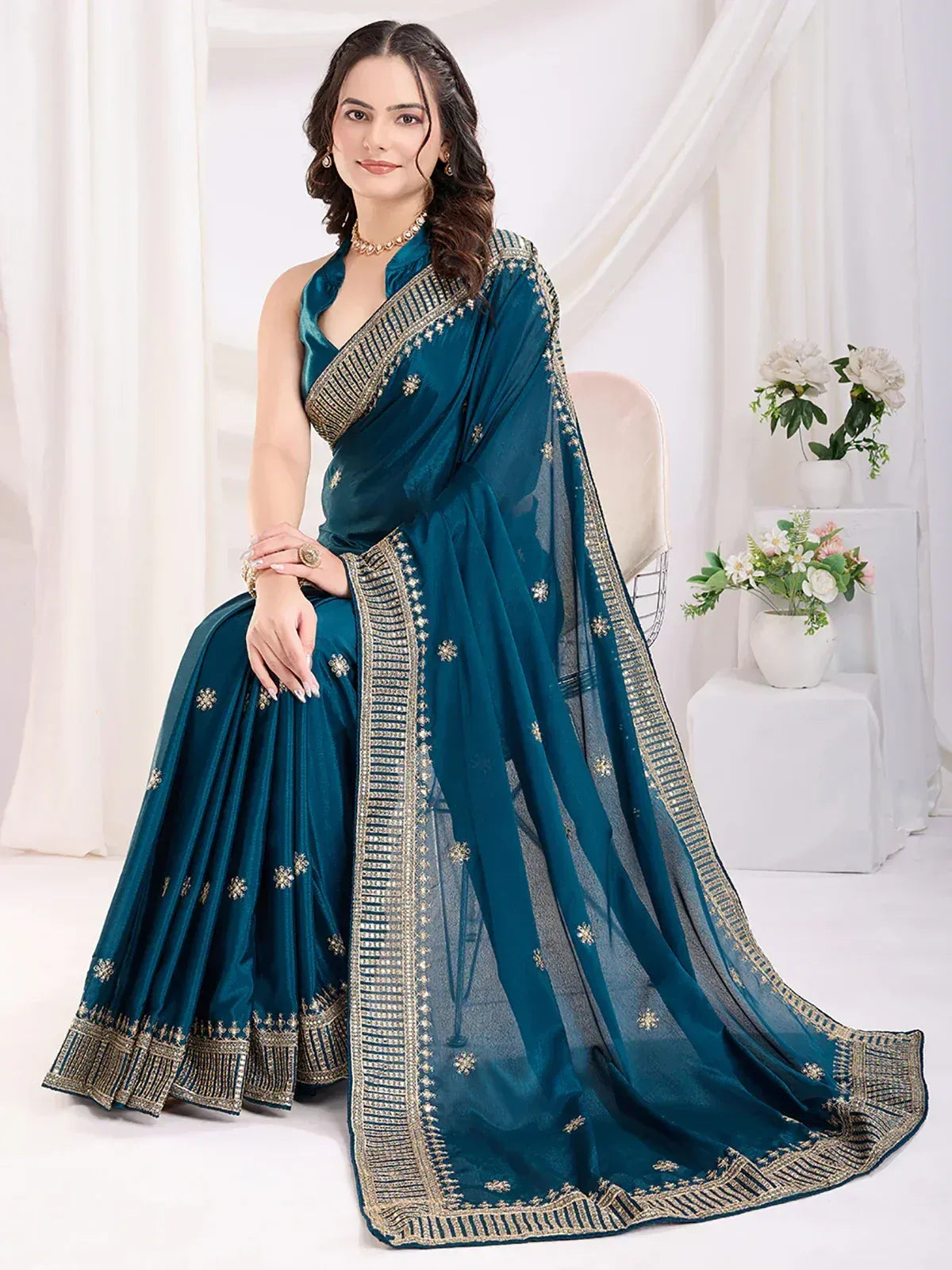 Teal designer saree with gold embroidery, perfect for Indian ethnic wear and festive occasions