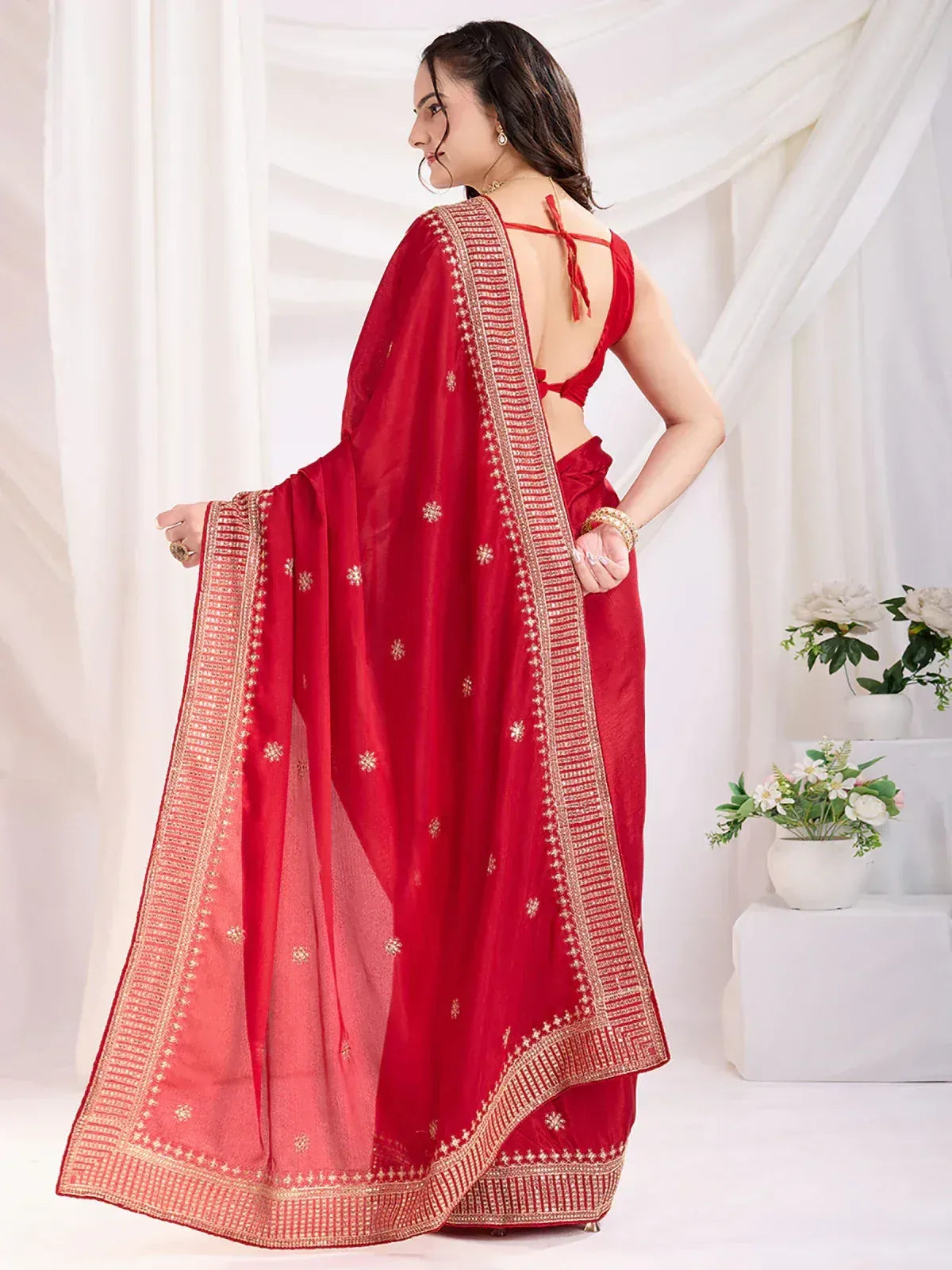 Red embroidered saree with gold border and backless blouse, Indian ethnic wear