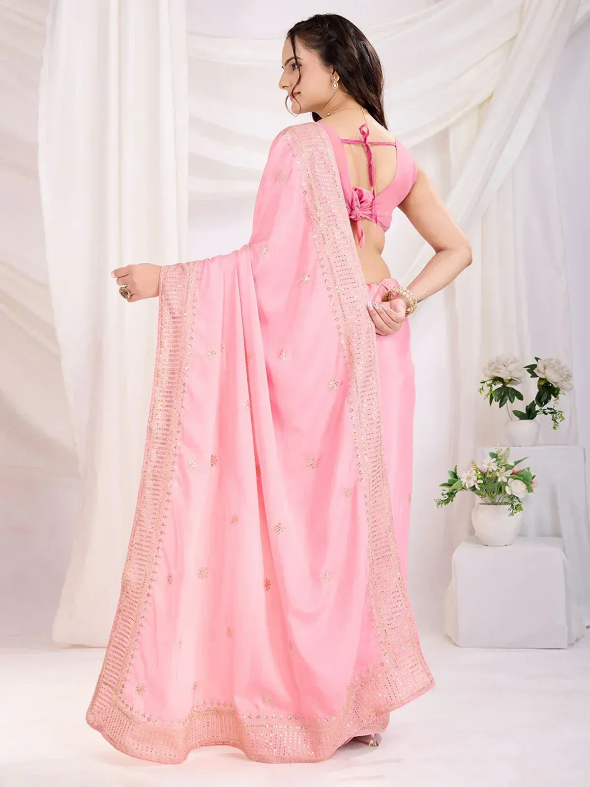 Pink designer saree with gold embroidery and back tie blouse, elegant ethnic wear for women