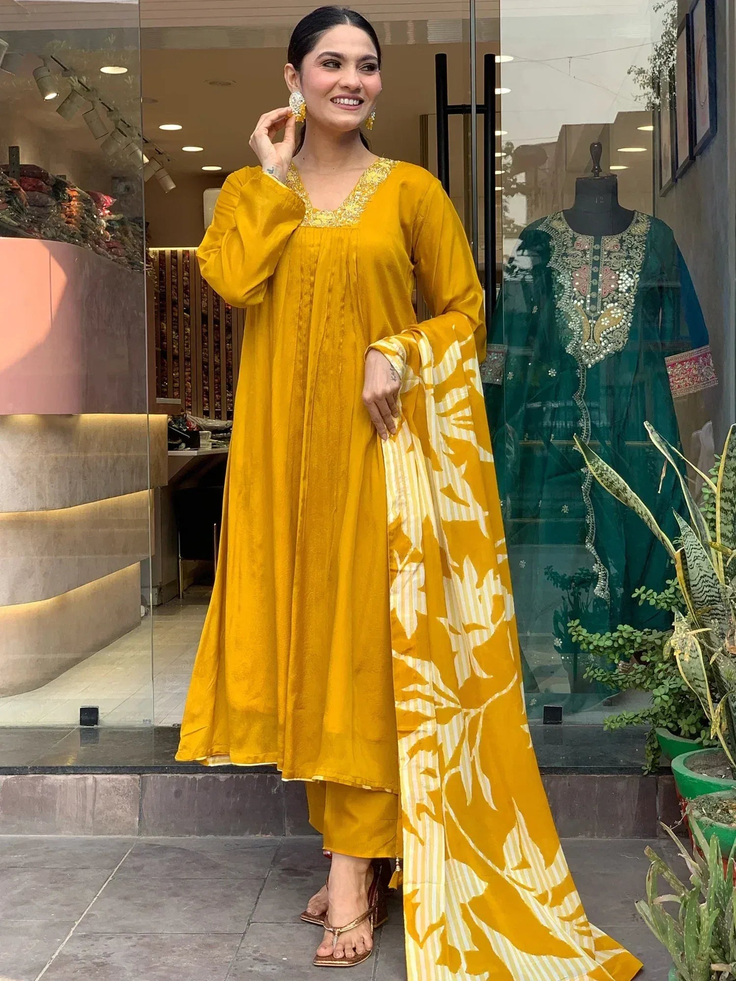 Mustard yellow ethnic kurta set with floral dupatta, perfect for Indian occasions and festive wear