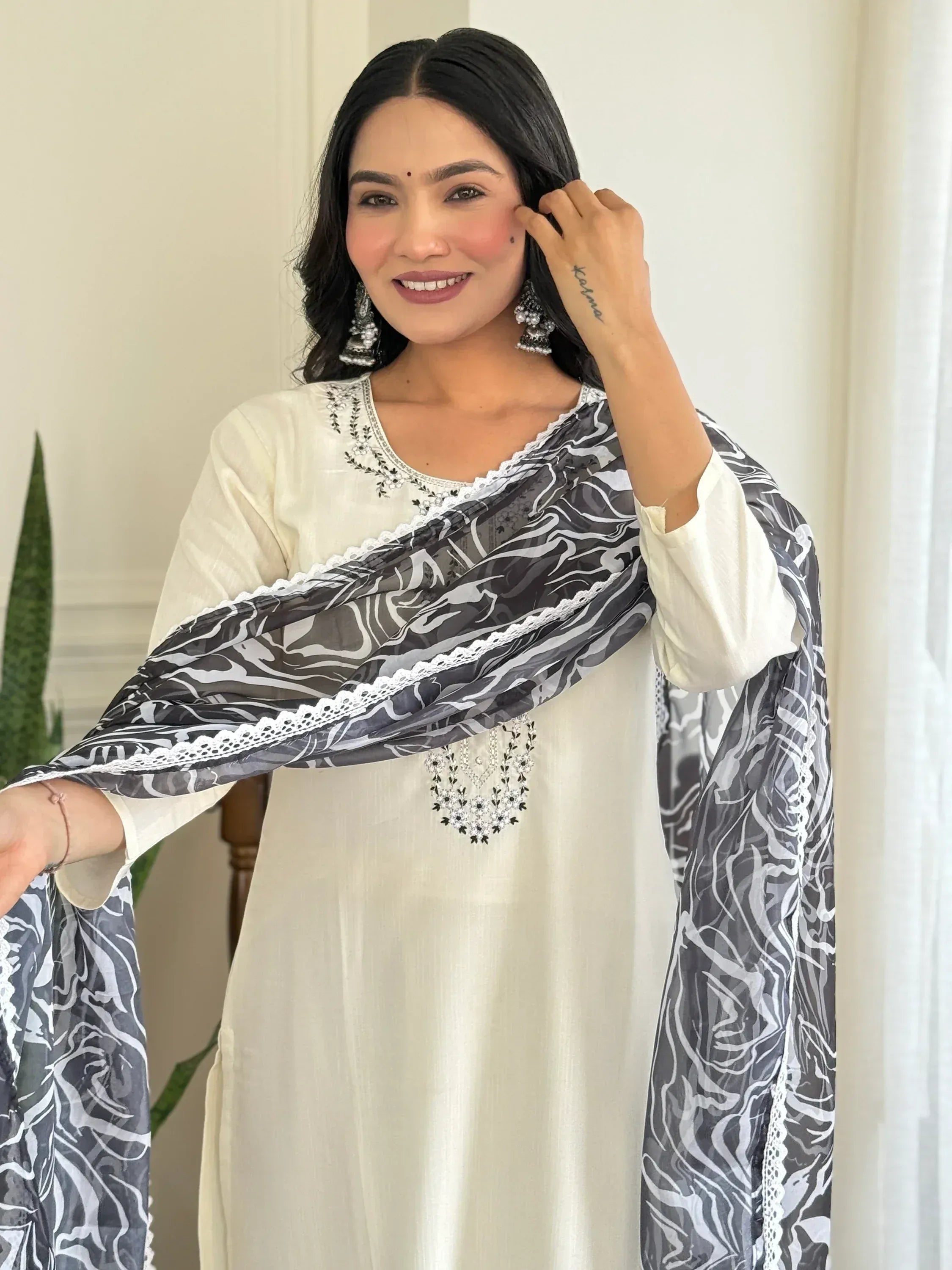 Elegant white kurta with black and white printed dupatta, perfect for Indian ethnic wear occasions.