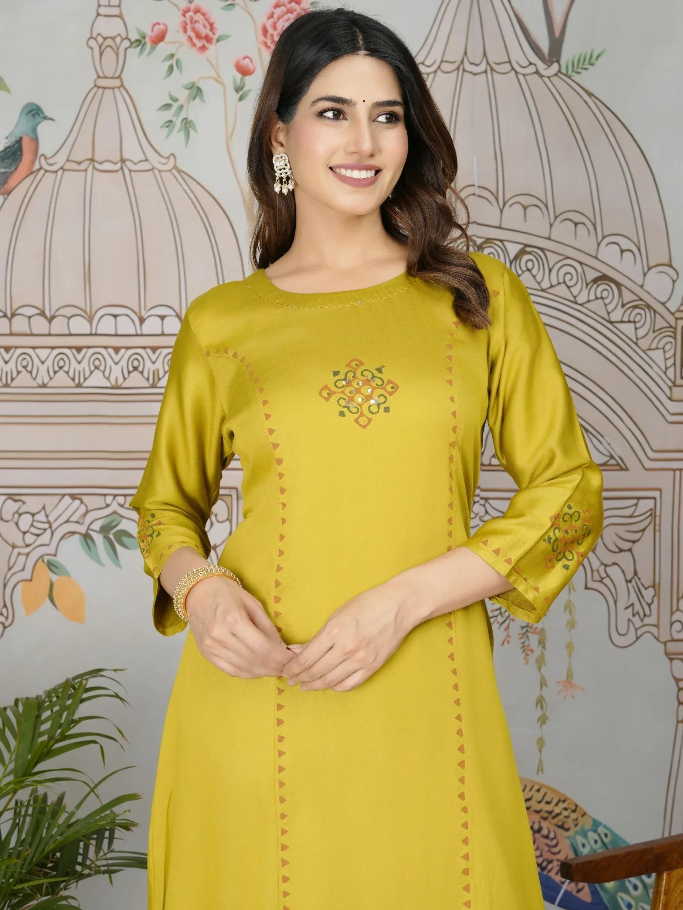 Yellow embroidered ethnic kurti with mirror work, perfect for Indian wear and festive occasions