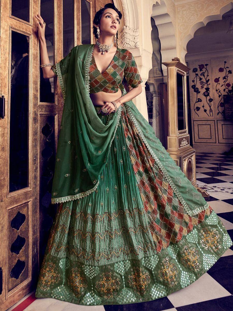 Green embroidered lehenga choli with patterned blouse and dupatta, Indian ethnic wear for weddings