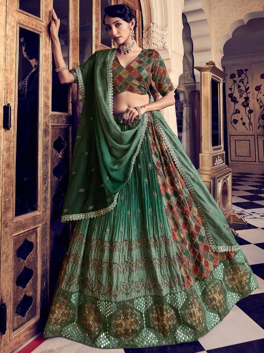 Green embroidered lehenga choli with patterned blouse and dupatta, Indian ethnic wear