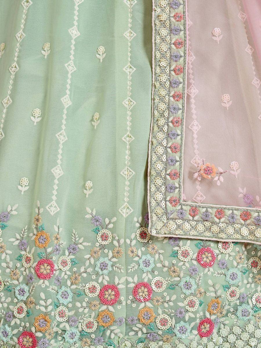 Mint green embroidered lehenga with floral motifs and matching dupatta, ideal for Indian ethnic wear occasions