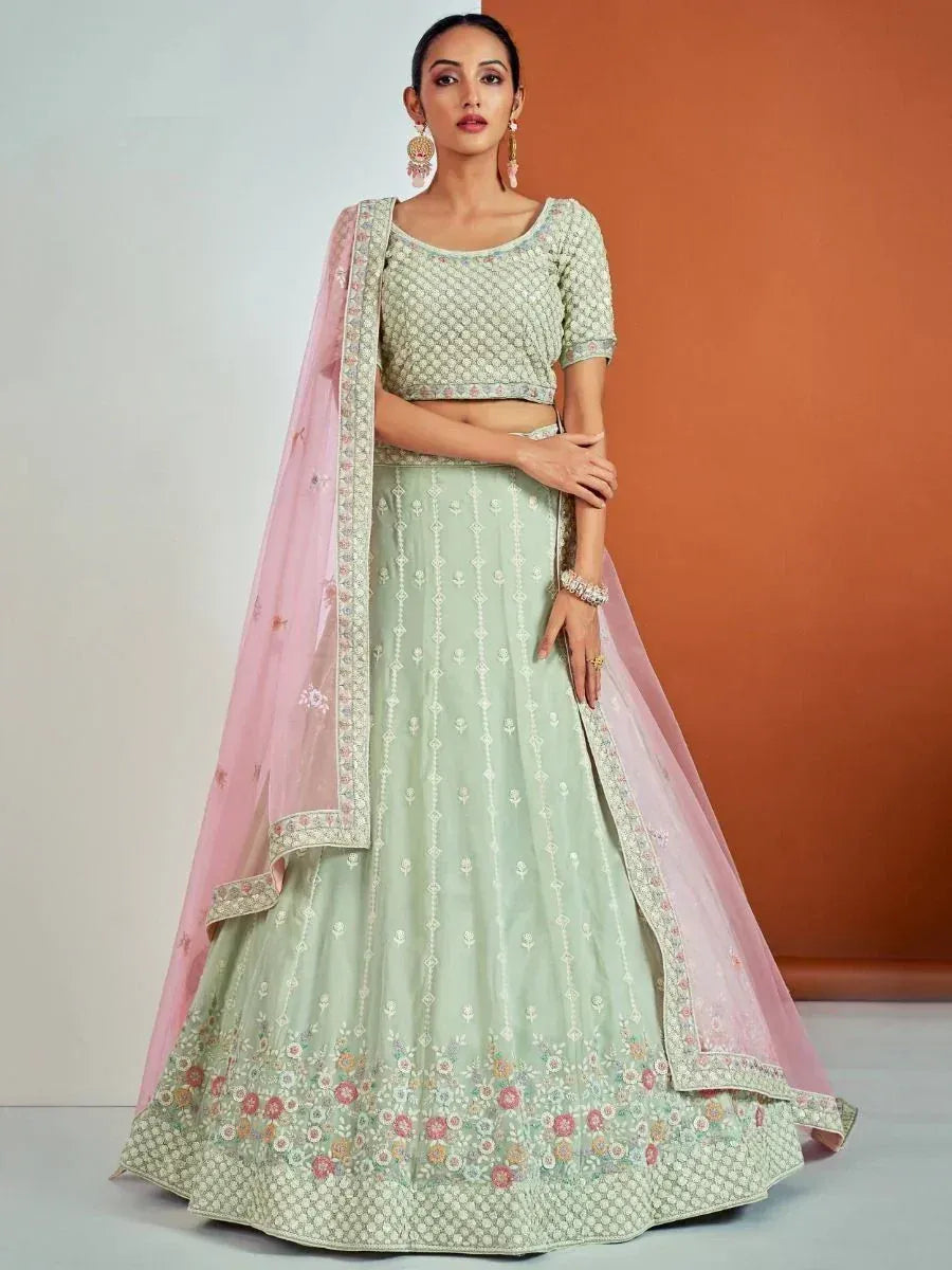 Mint green embroidered lehenga choli with pink dupatta, Indian ethnic wear for weddings and festivals