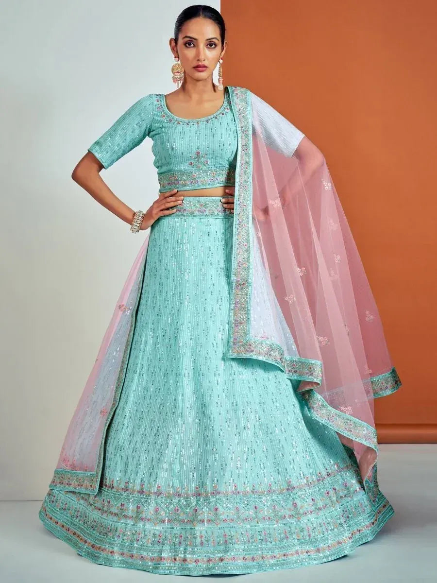 Mint green embroidered lehenga choli with pink dupatta, Indian ethnic wear for weddings and parties