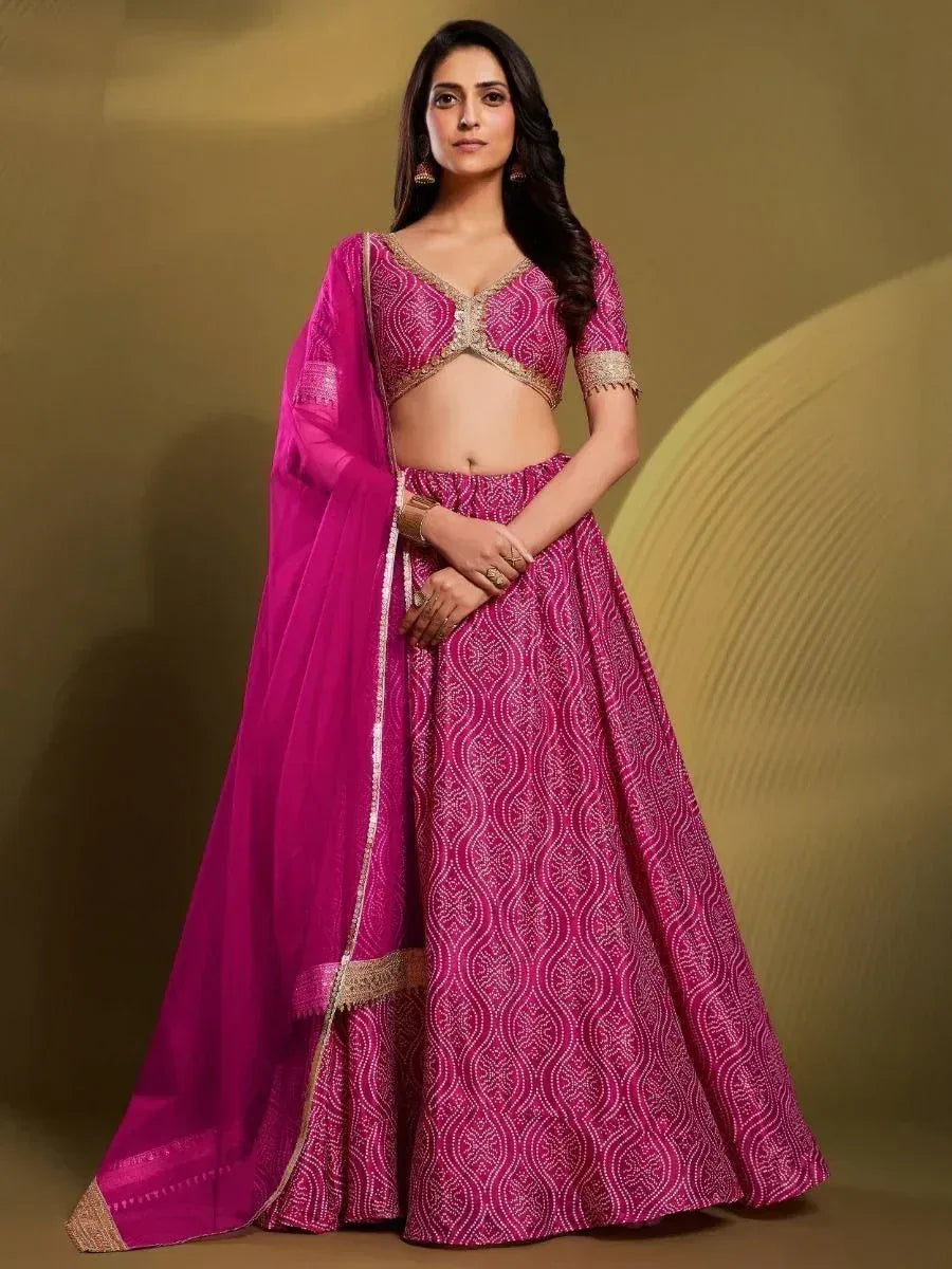 Pink designer lehenga choli with gold embroidery and matching dupatta, ethnic wear for women