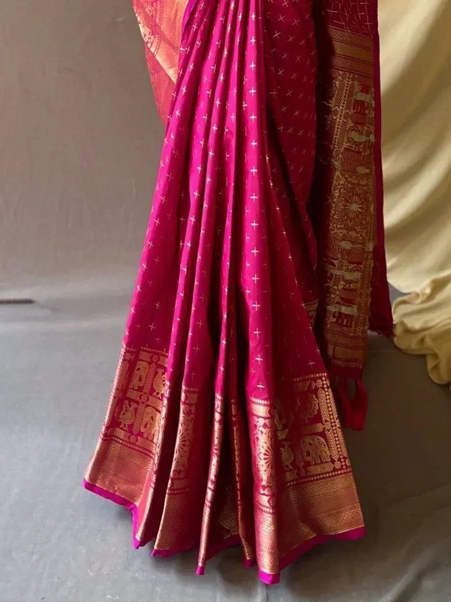 Pink silk saree with gold elephant motifs and temple border, Indian ethnic wear