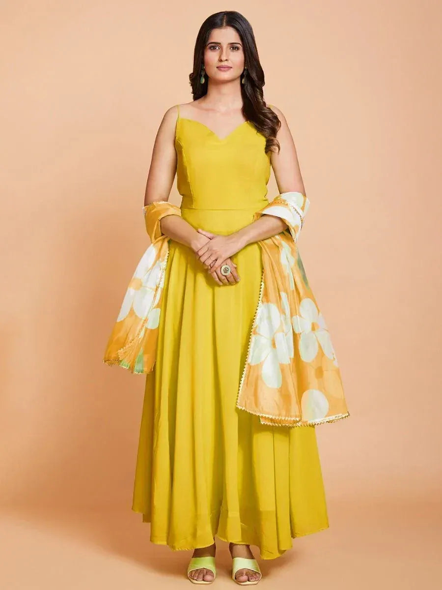 Yellow ethnic gown with floral dupatta, perfect for Indian occasions and festive wear