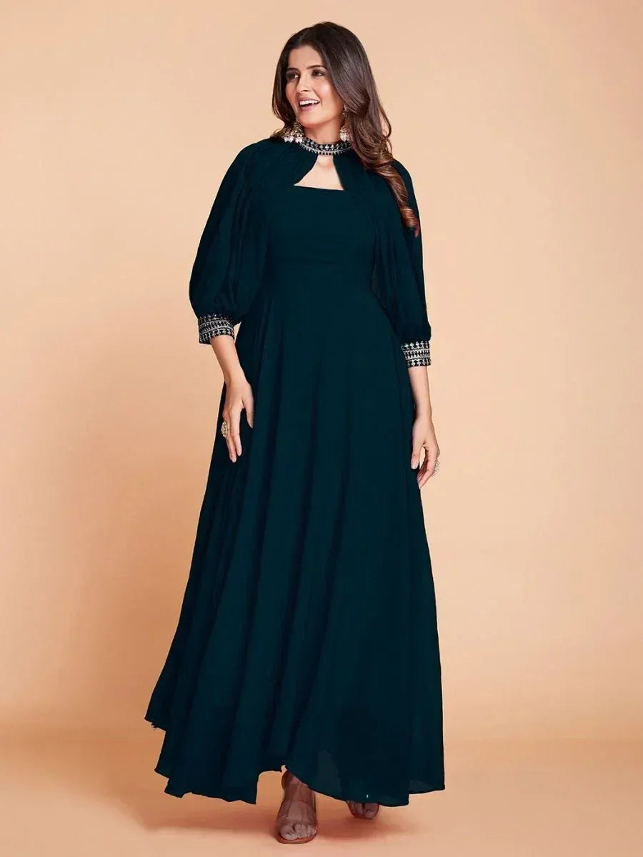 Elegant dark green ethnic gown with embellished sleeves and neckline, perfect for festive occasions