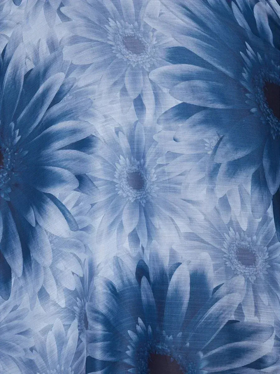Blue floral print fabric for ethnic wear, featuring delicate daisy patterns in shades of indigo and white.